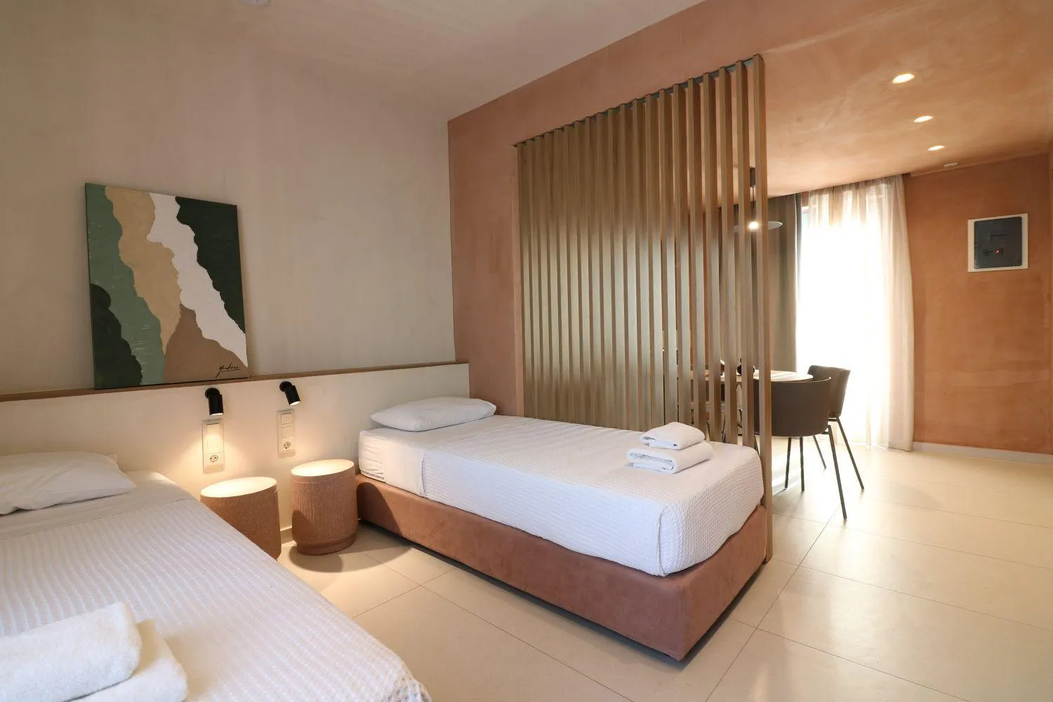 Bed in Philoxenia Apartments