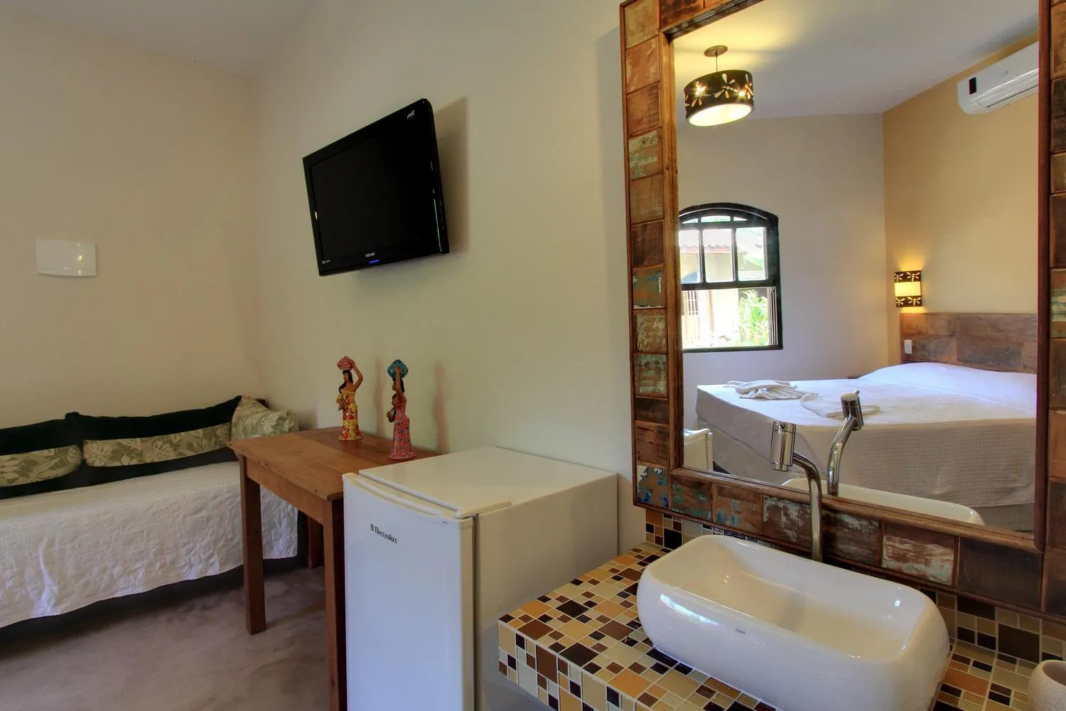 Bed in Pousada Tupinamba