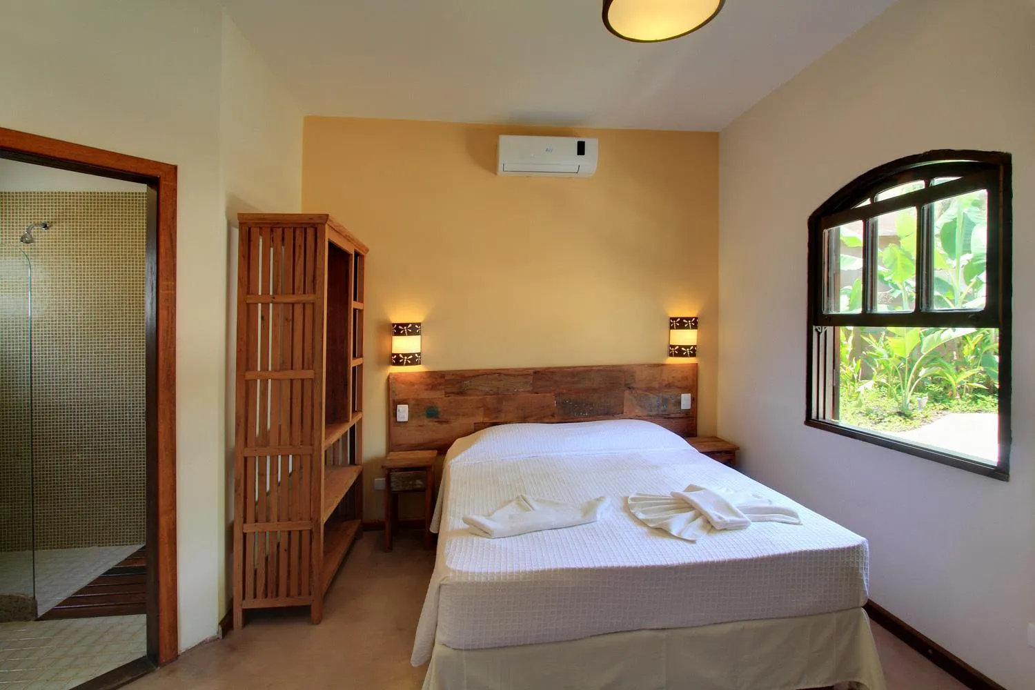 Bed in Pousada Tupinamba