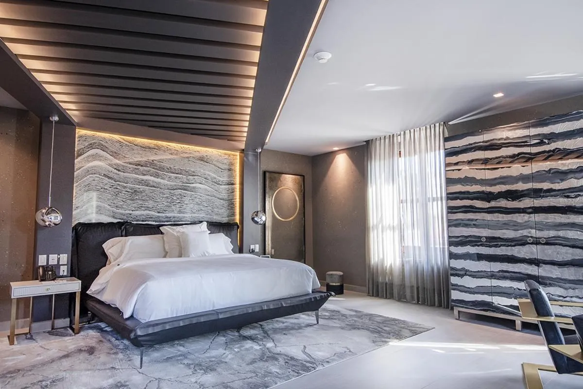 Bed in L Hotel Perla Boutique