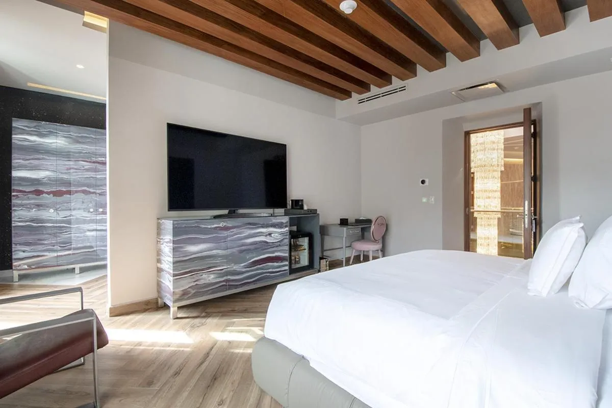 Bed in L Hotel Perla Boutique