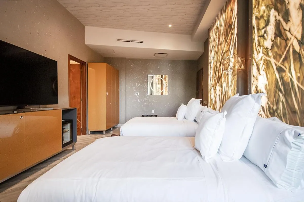 Bed in L Hotel Perla Boutique