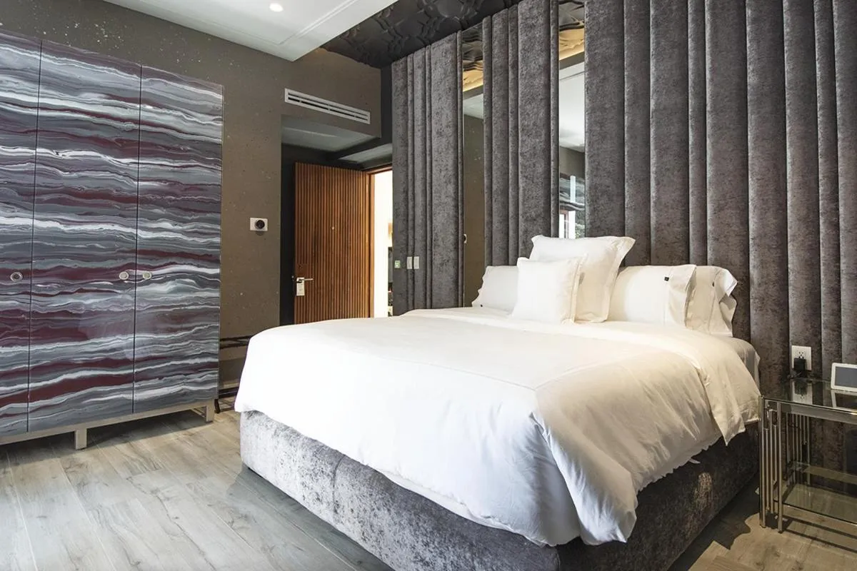 Bed in L Hotel Perla Boutique