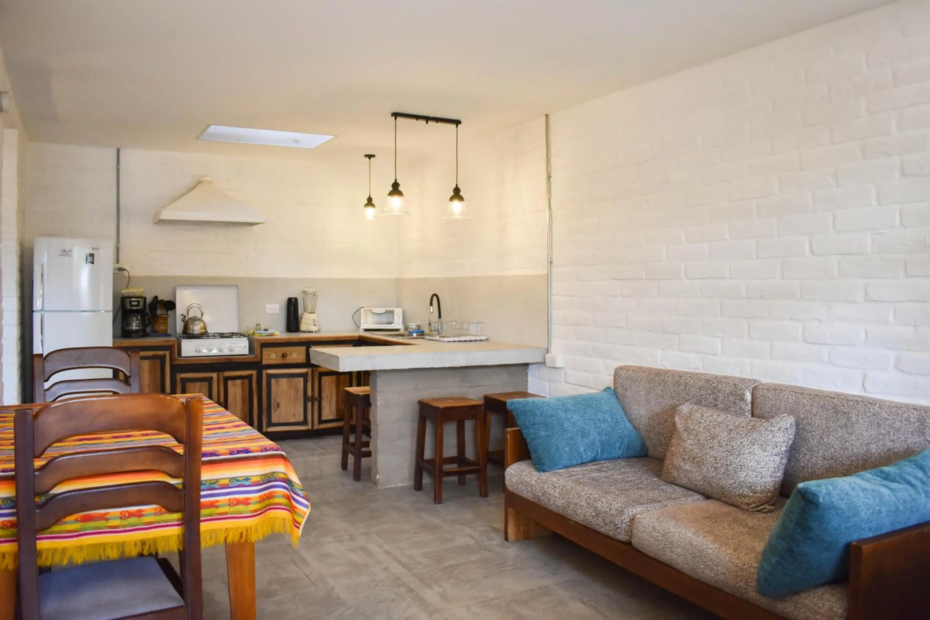 Kitchen or kitchenette in Apartamentos Otorongo Cuenca Ecuador