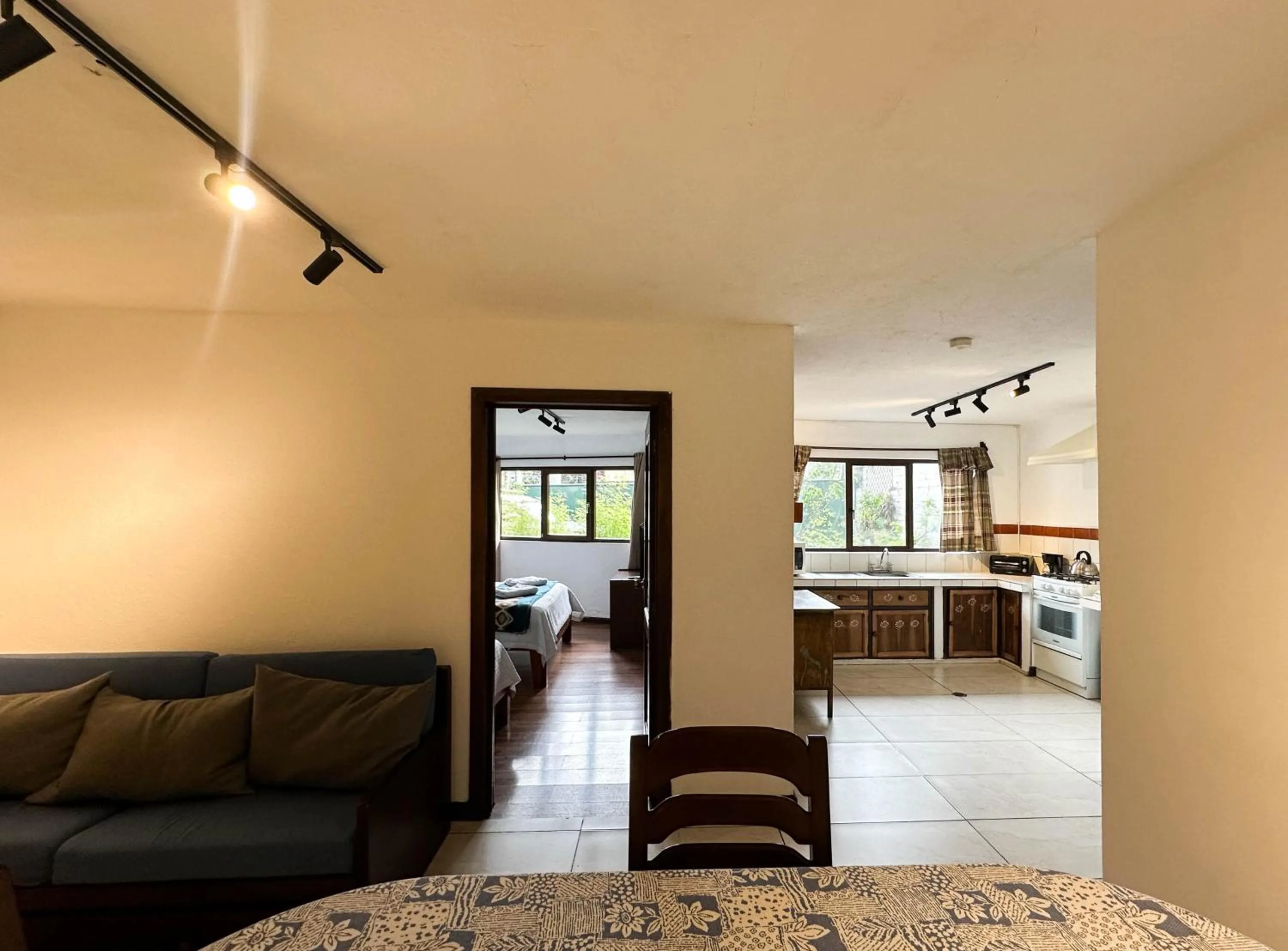Living room, Bed in Apartamentos Otorongo Cuenca Ecuador
