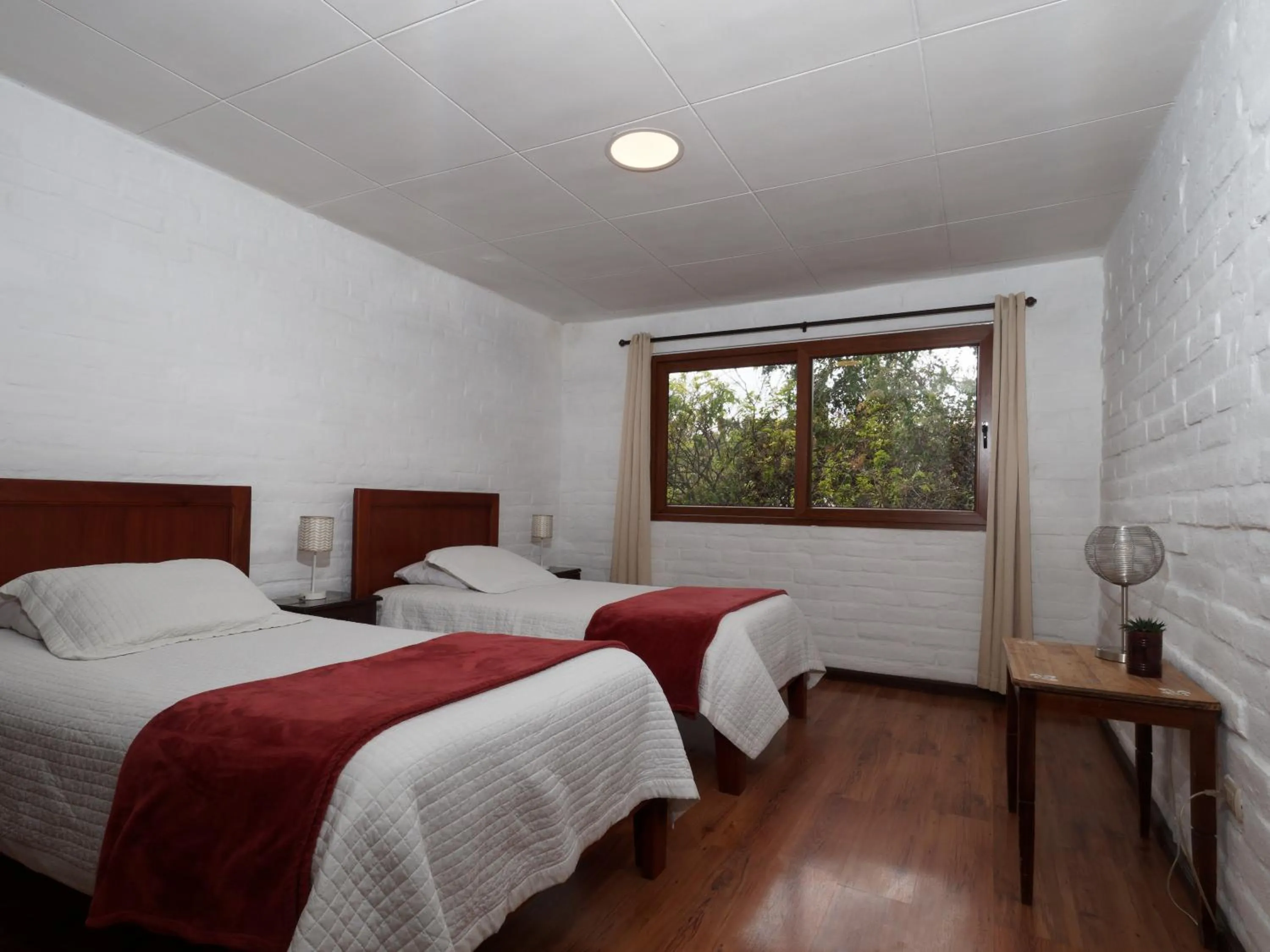 Photo of the whole room, Bed in Apartamentos Otorongo Cuenca Ecuador