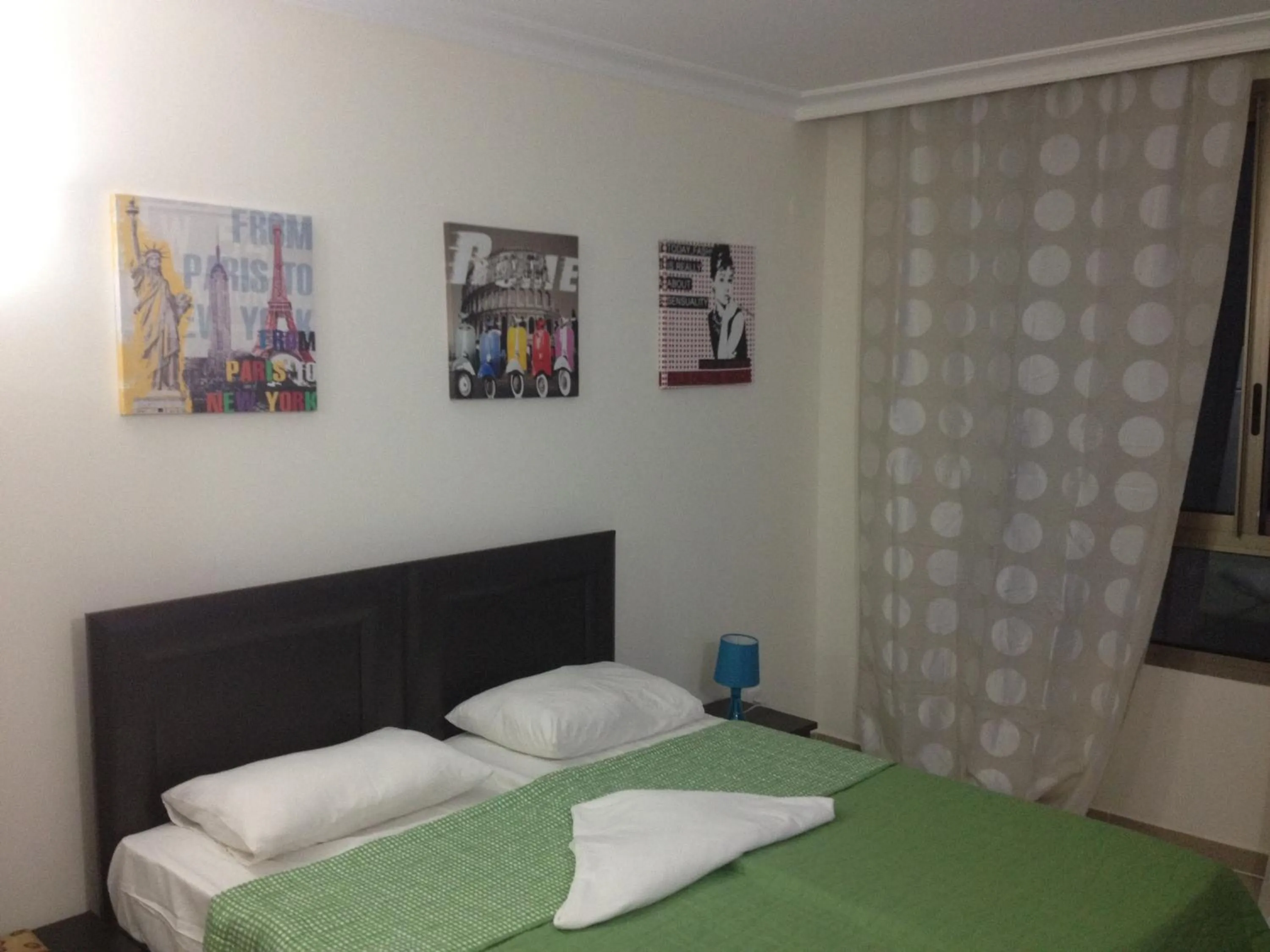 Bed in Apartments on the Beach