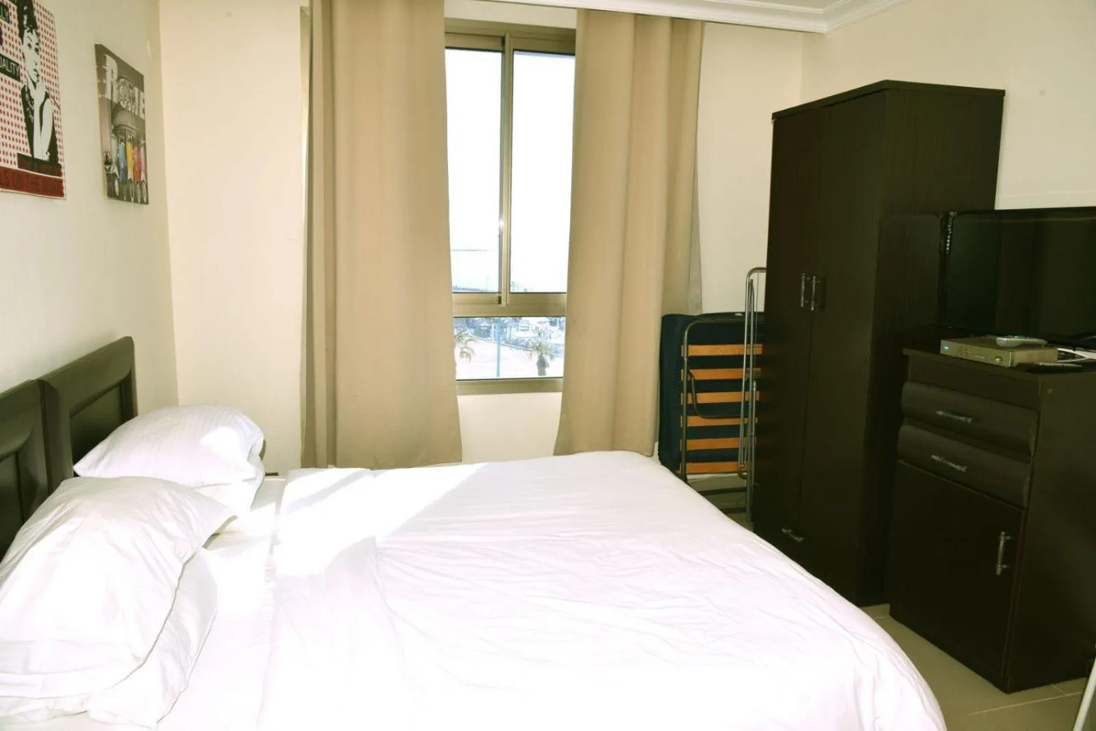 Bed in Apartments on the Beach