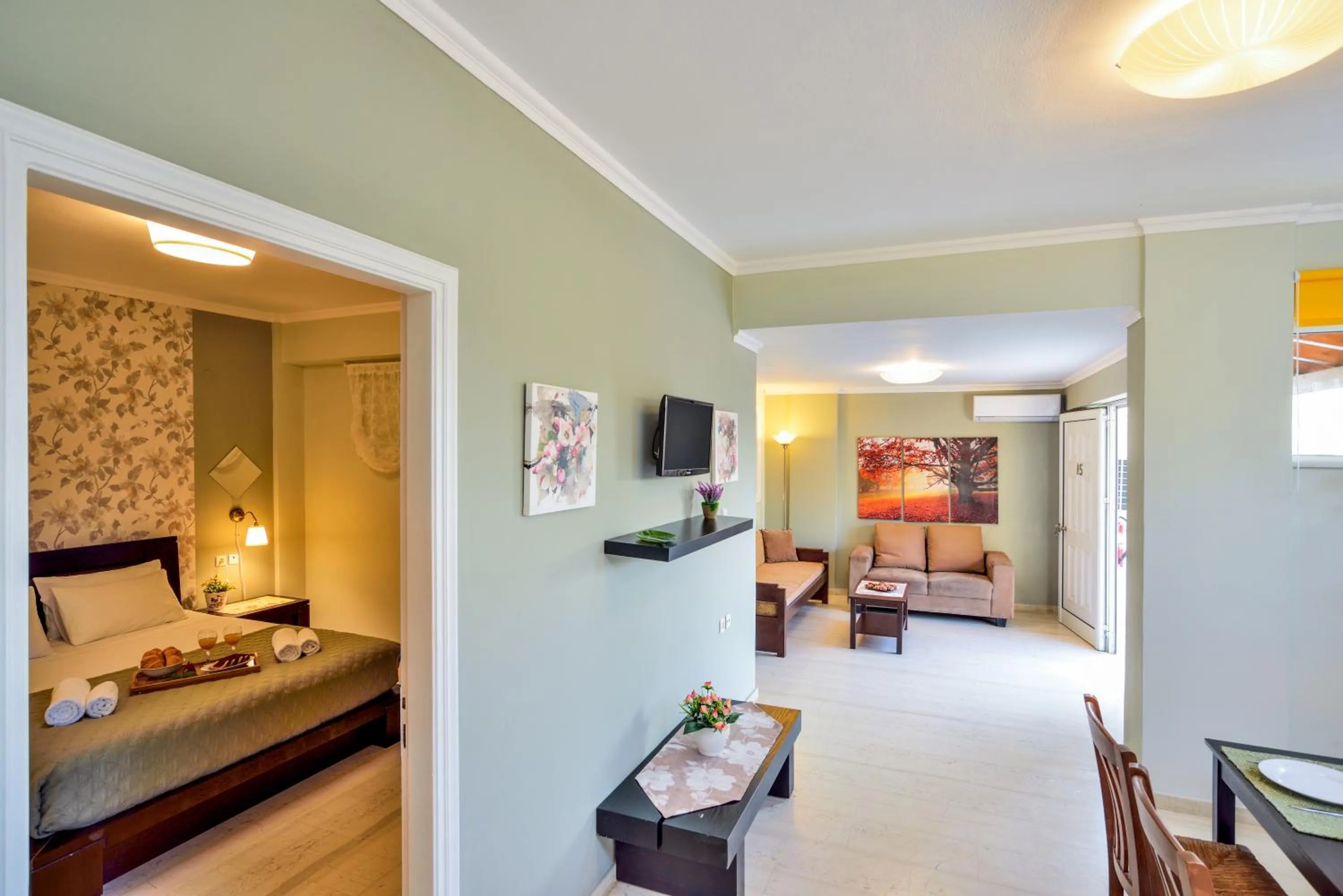 Living room, Bed in Poseidon Apartments