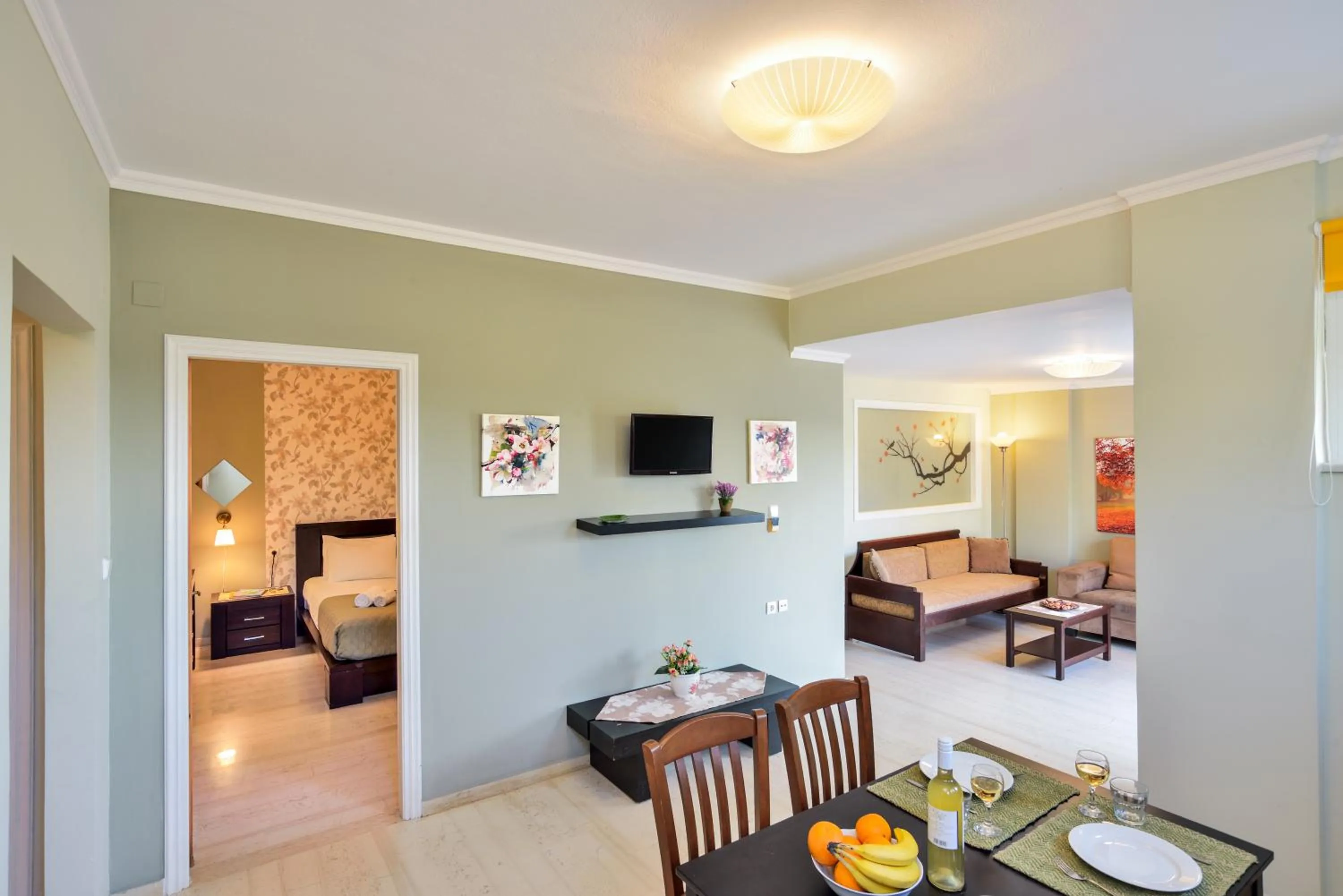 Living room, Bed in Poseidon Apartments