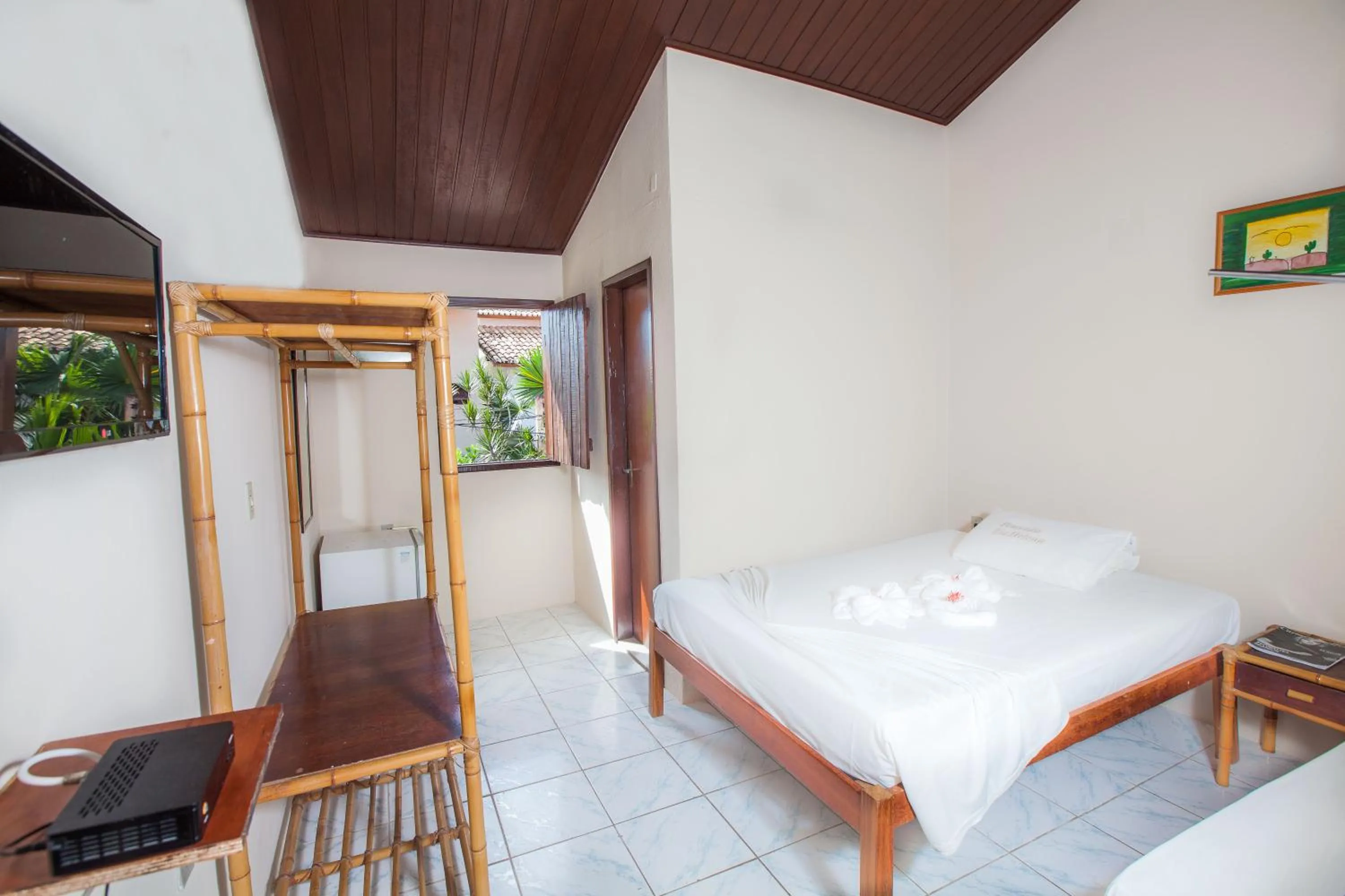 Bed in Pousada Tia Helena