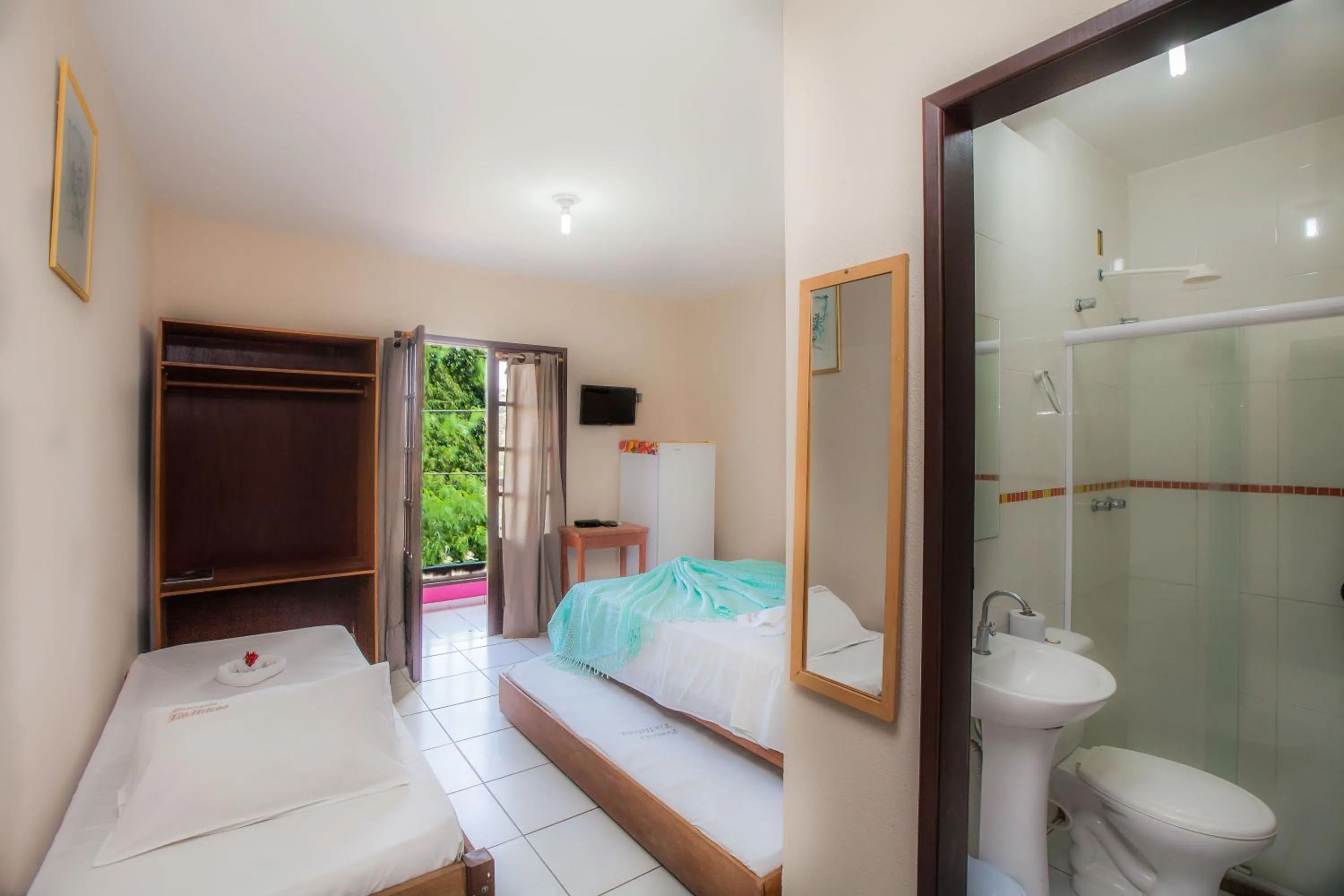 Bed in Pousada Tia Helena