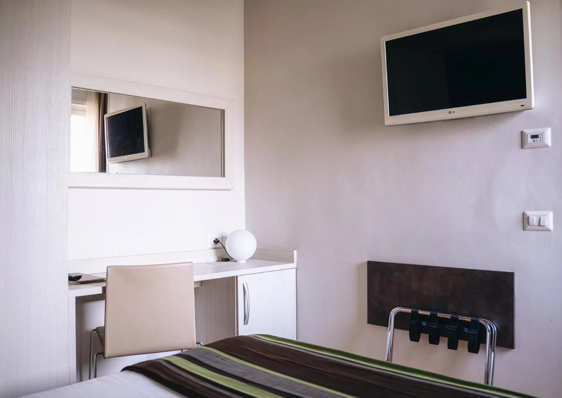 Bedroom in HB Aosta Hotel & Balcony SPA