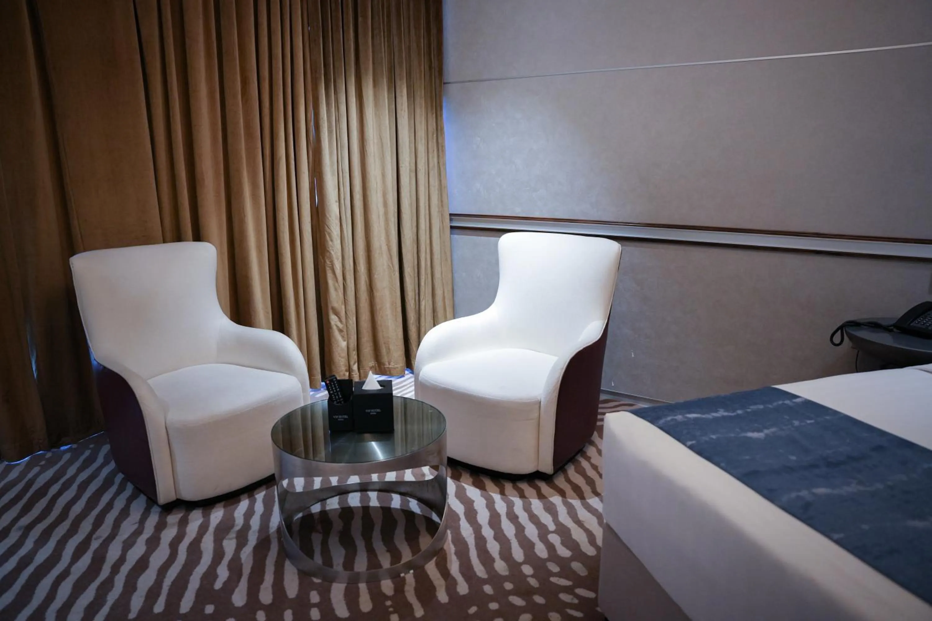 Seating area, Bed in VIP Hotel Doha Qatar