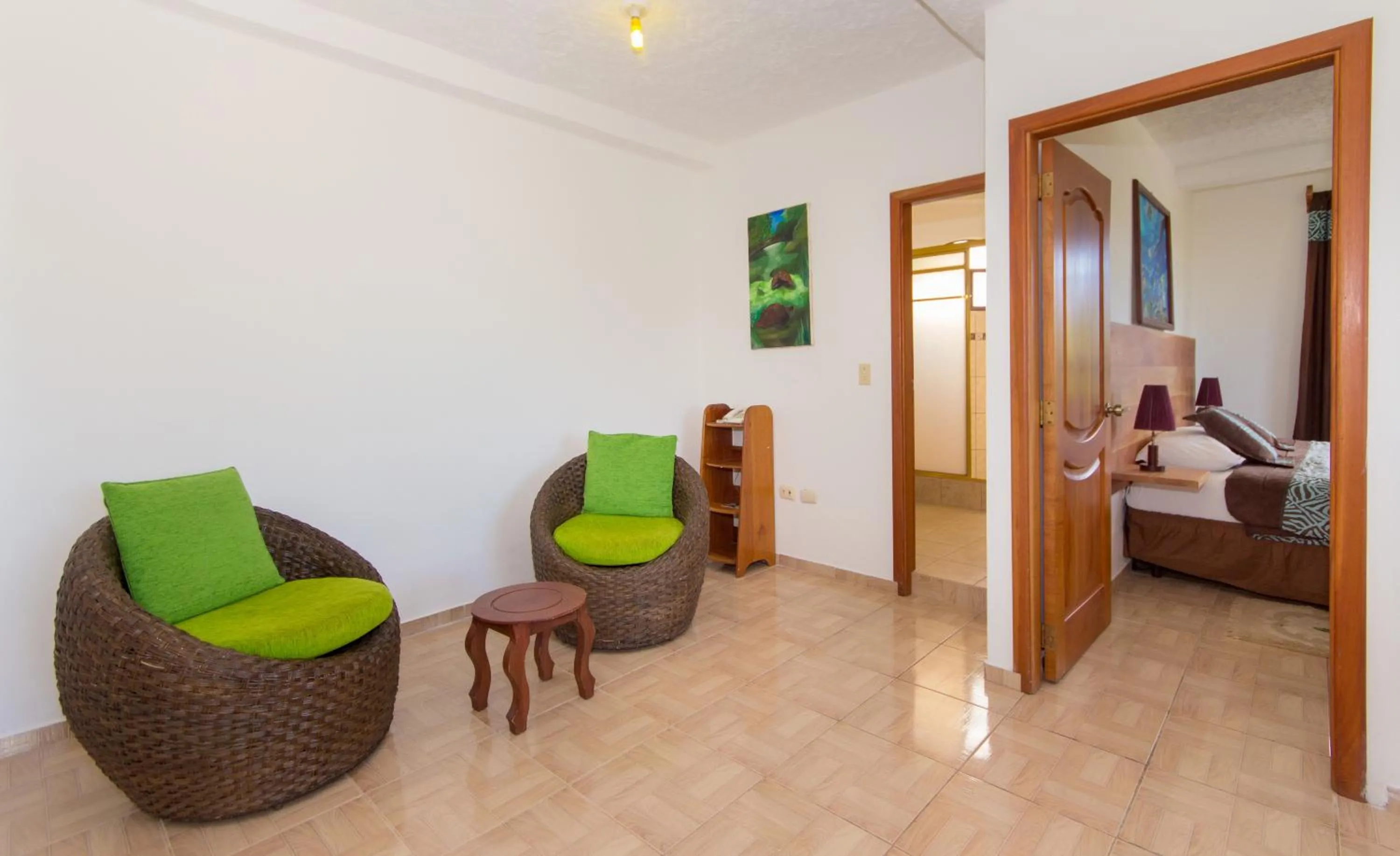 Living room, Bed in Hotel Twin Galápagos