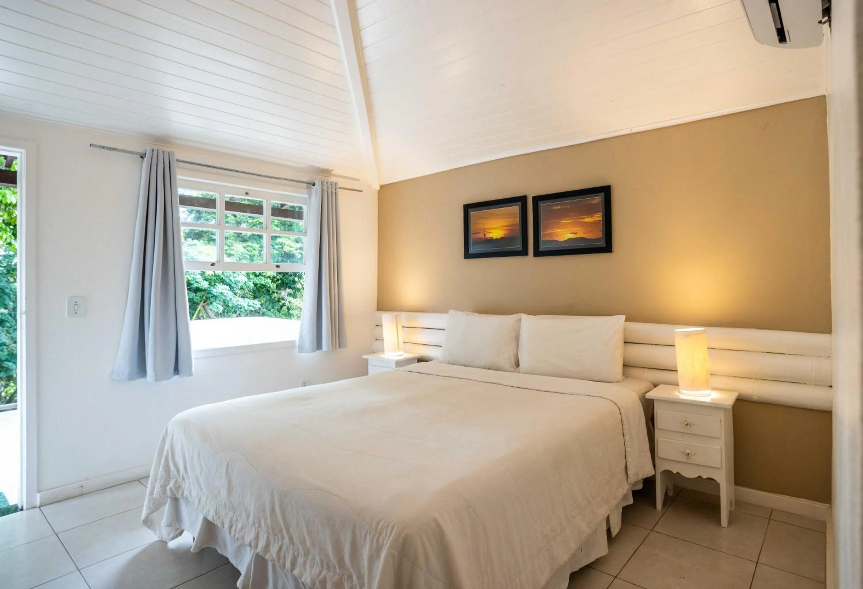 Bed in Pousada Vila Pitanga