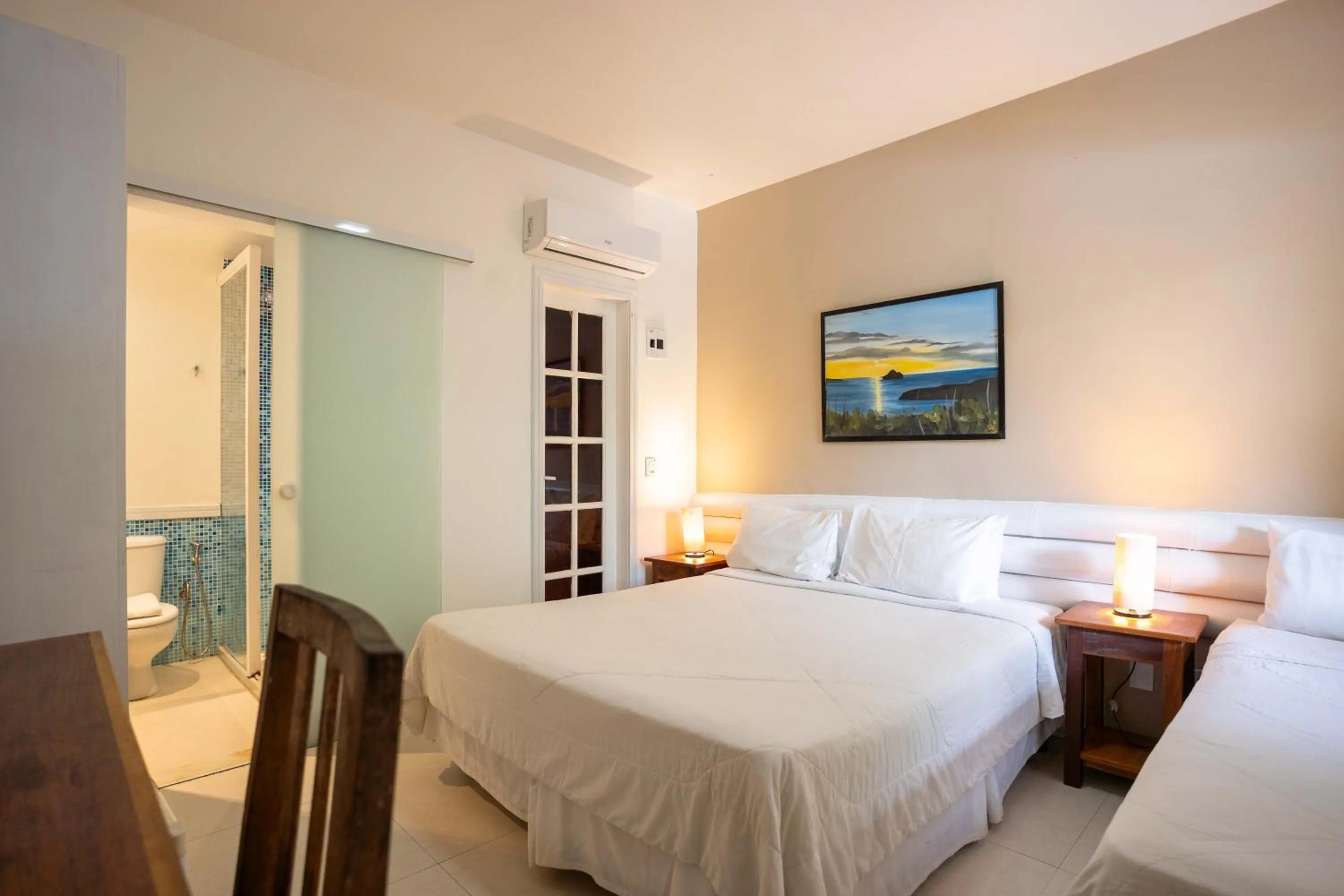 Bed in Pousada Vila Pitanga