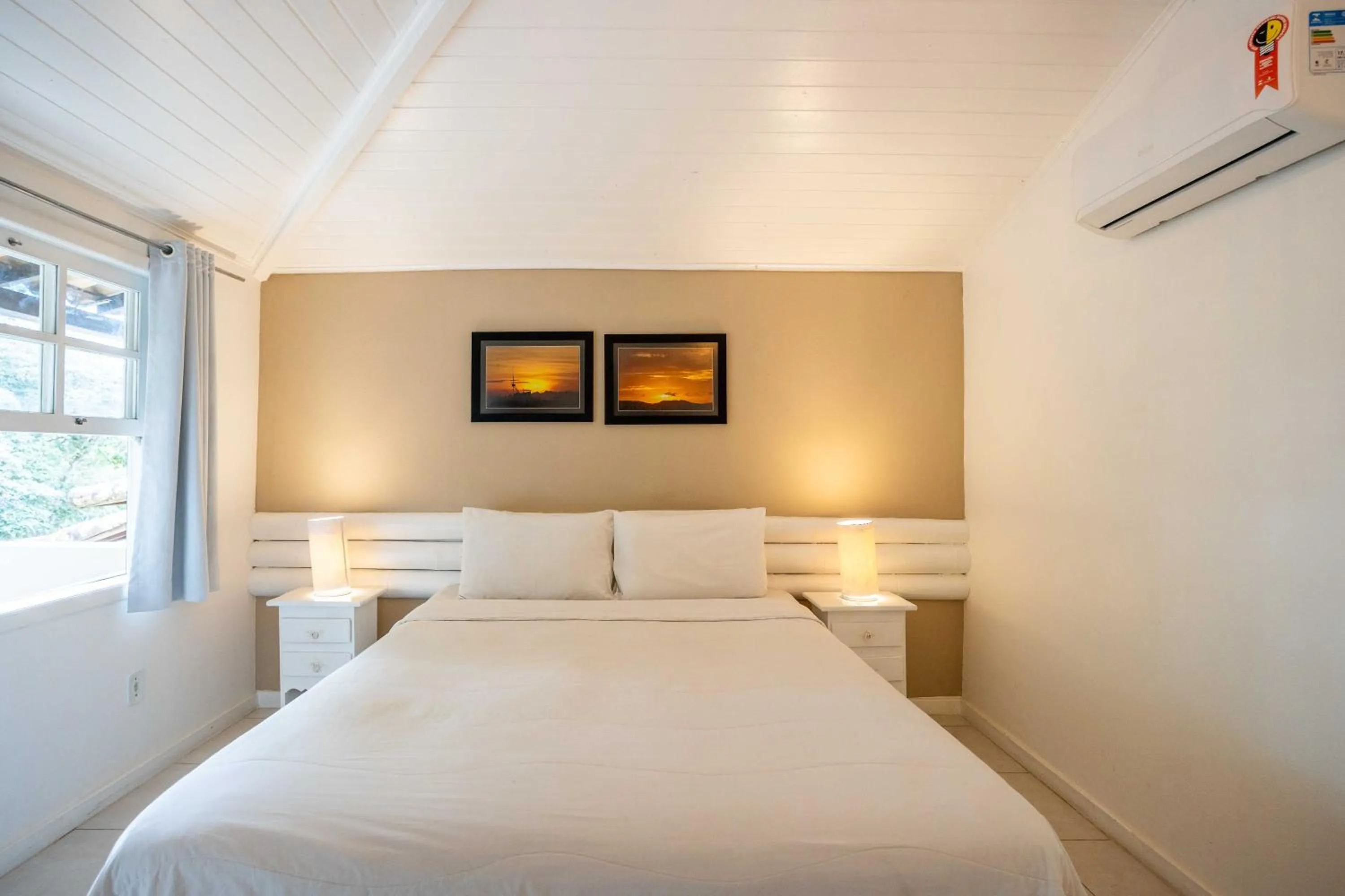 Bed in Pousada Vila Pitanga