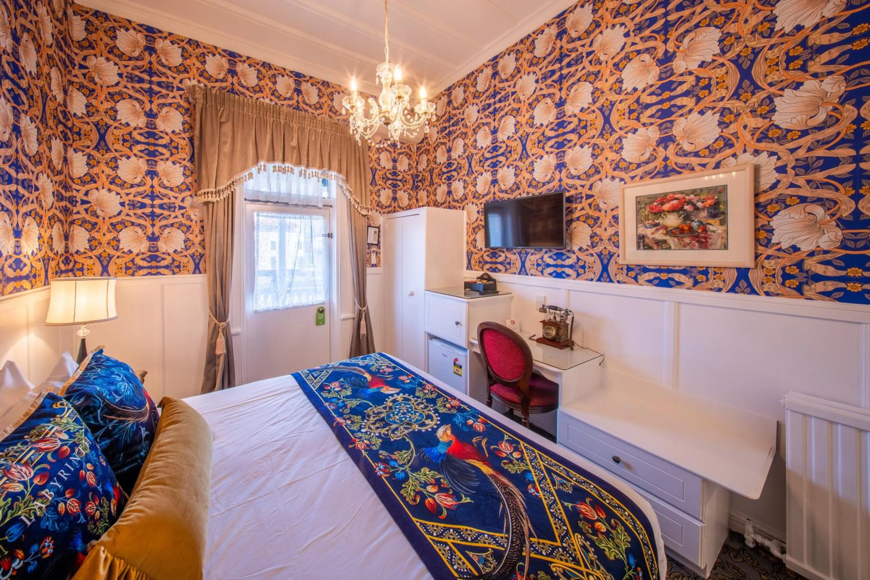 Bed in Prince's Gate Hotel