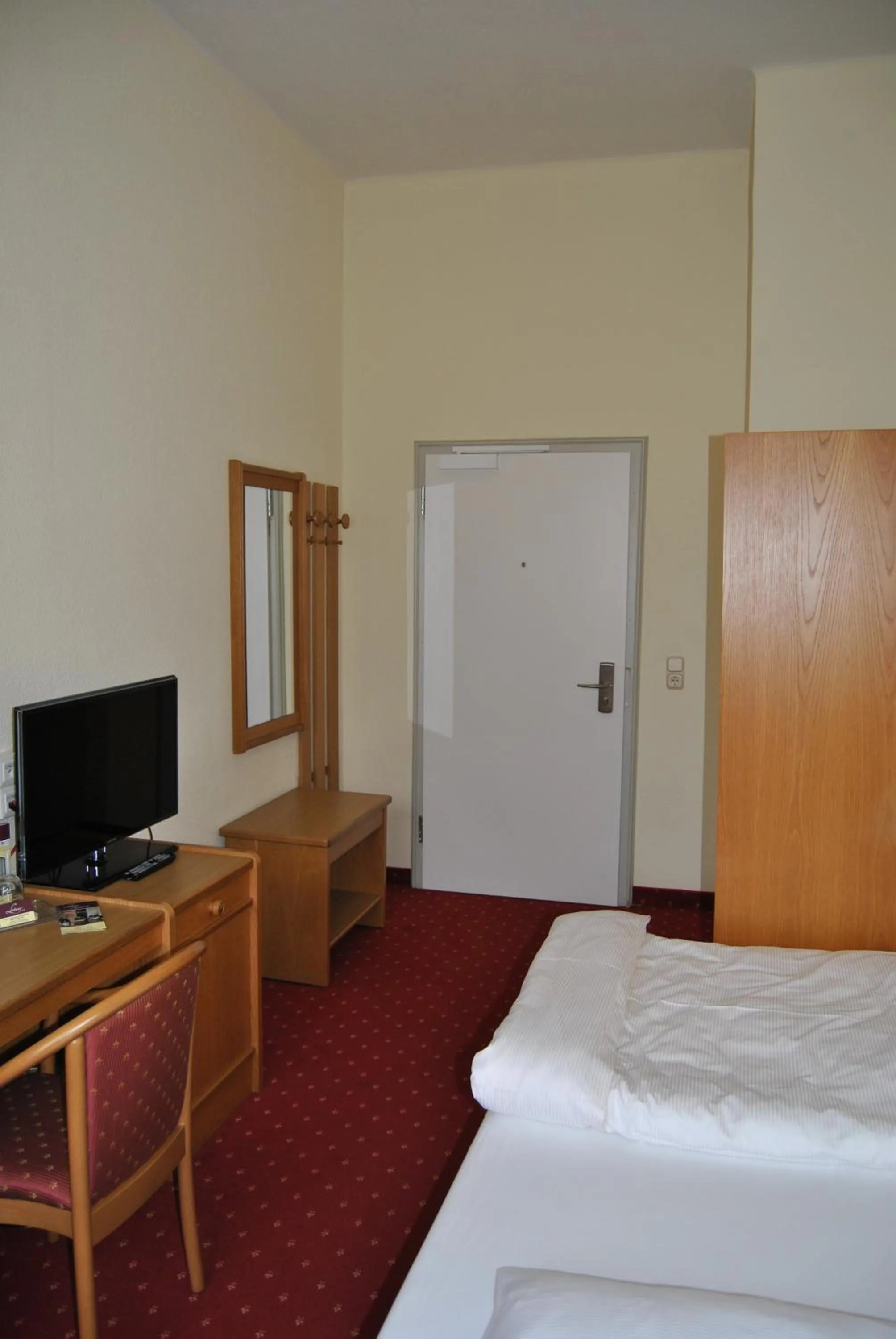 Decorative detail, Bed in Lodner Hotel Drei Mohren