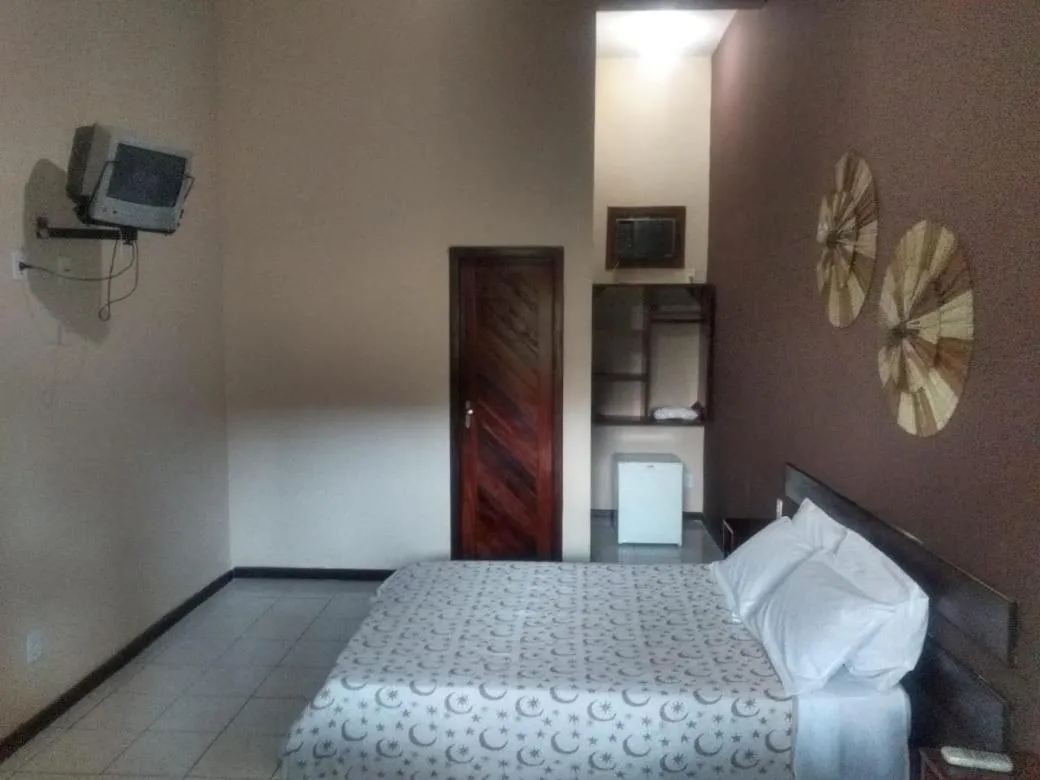 Bed in Pousada Portal do Sol