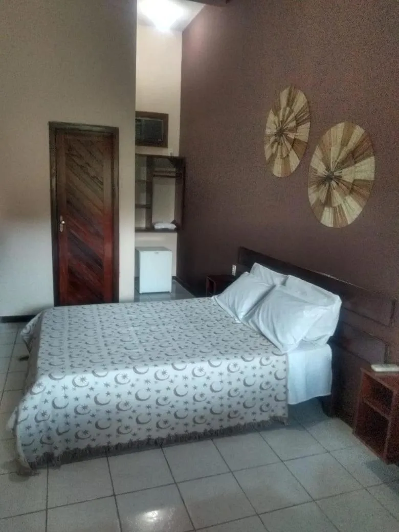 Bed in Pousada Portal do Sol