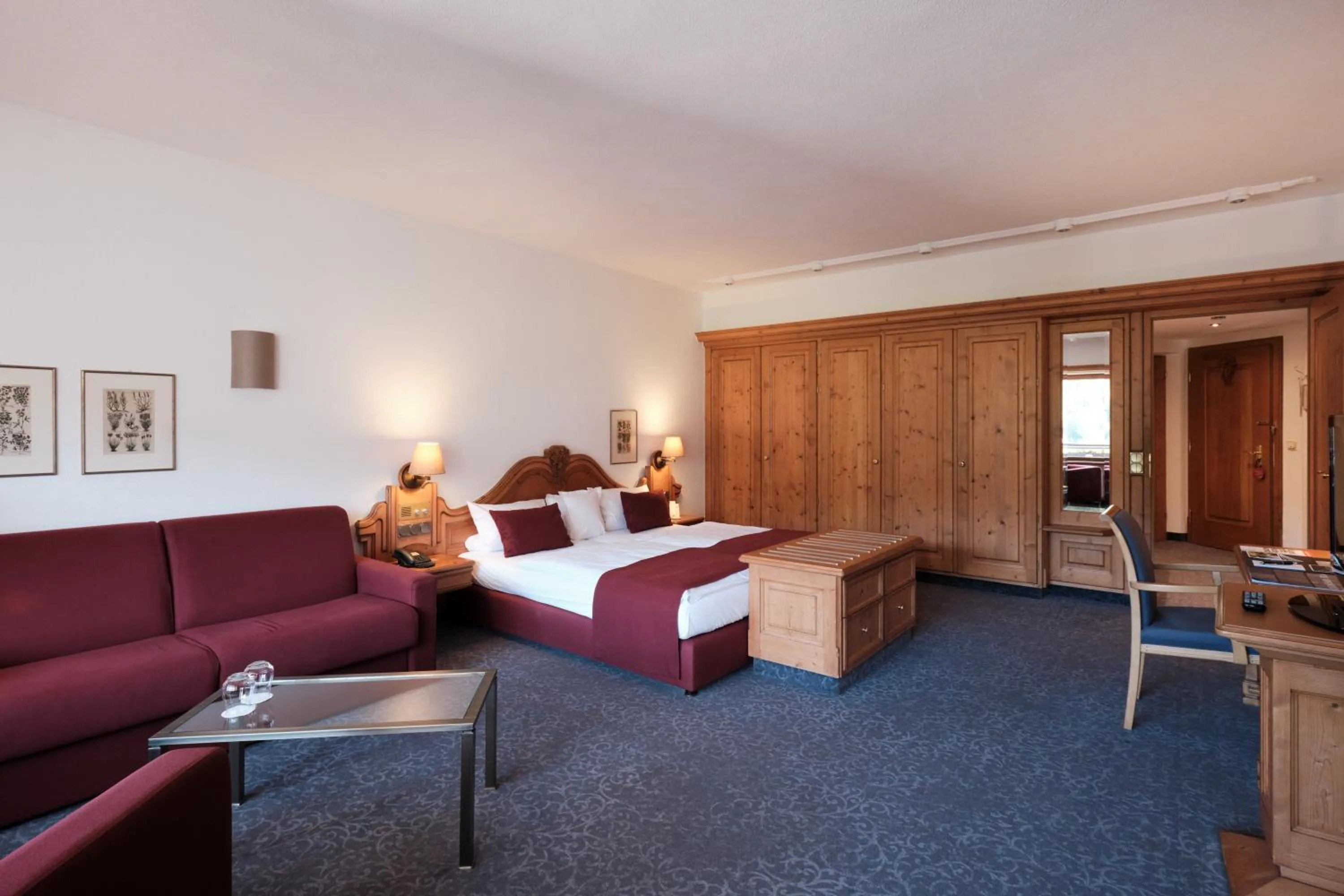 Living room, Bed in Hotel Traube Tonbach