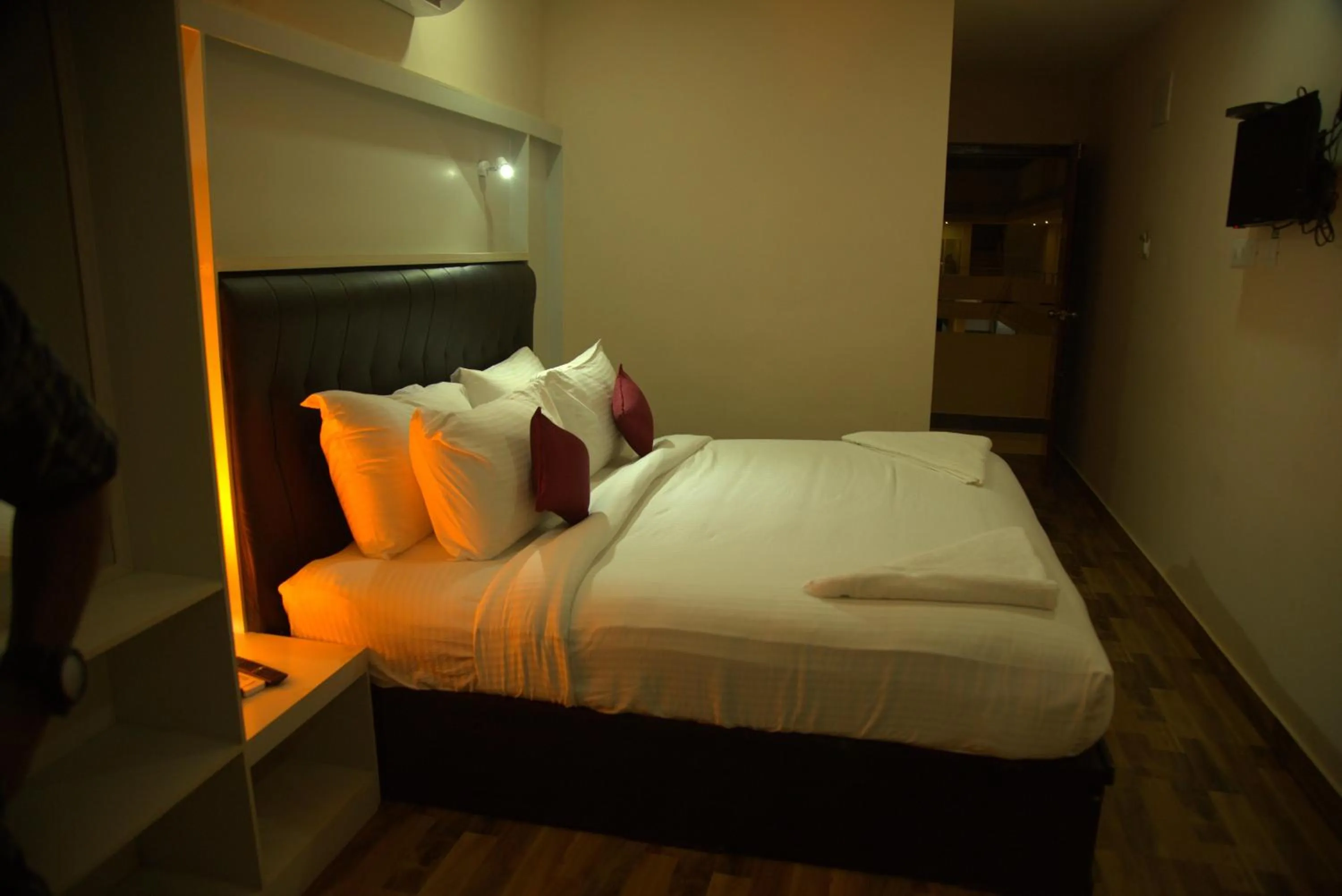 Bed in Hotel Wayanad Square