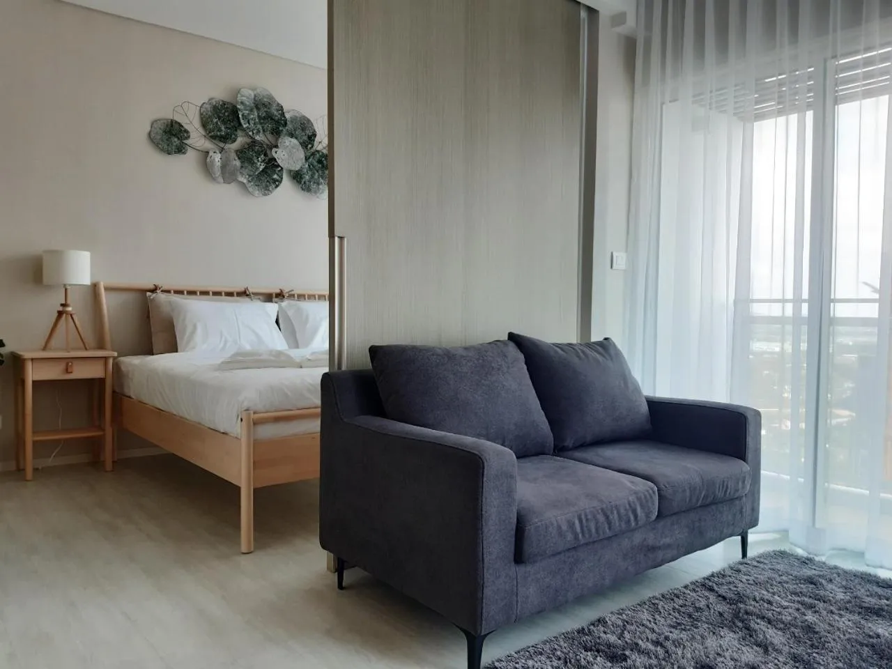 Seating area, Bed in Veranda Residence pattaya By Sea