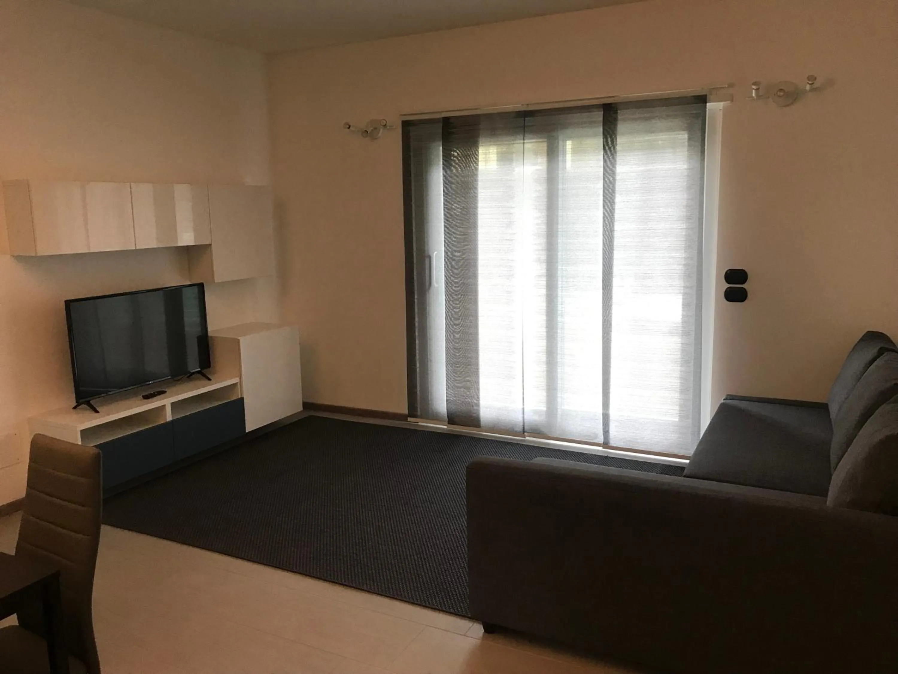 Communal lounge/ TV room in Hotel Residence Alessandra