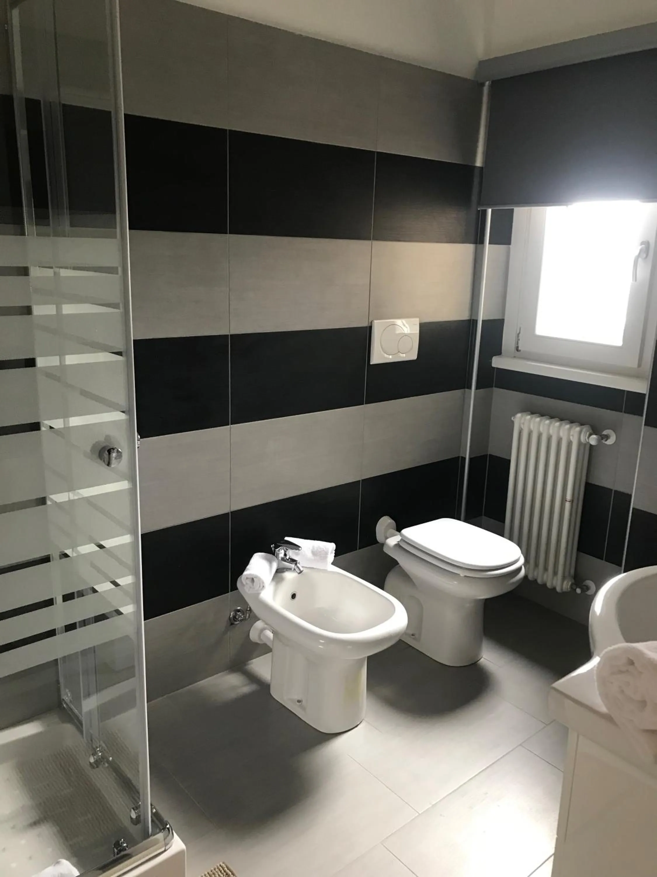 Toilet in Hotel Residence Alessandra