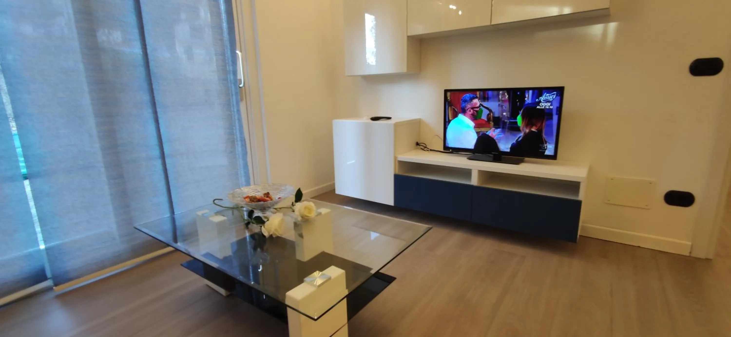 Communal lounge/ TV room in Hotel Residence Alessandra