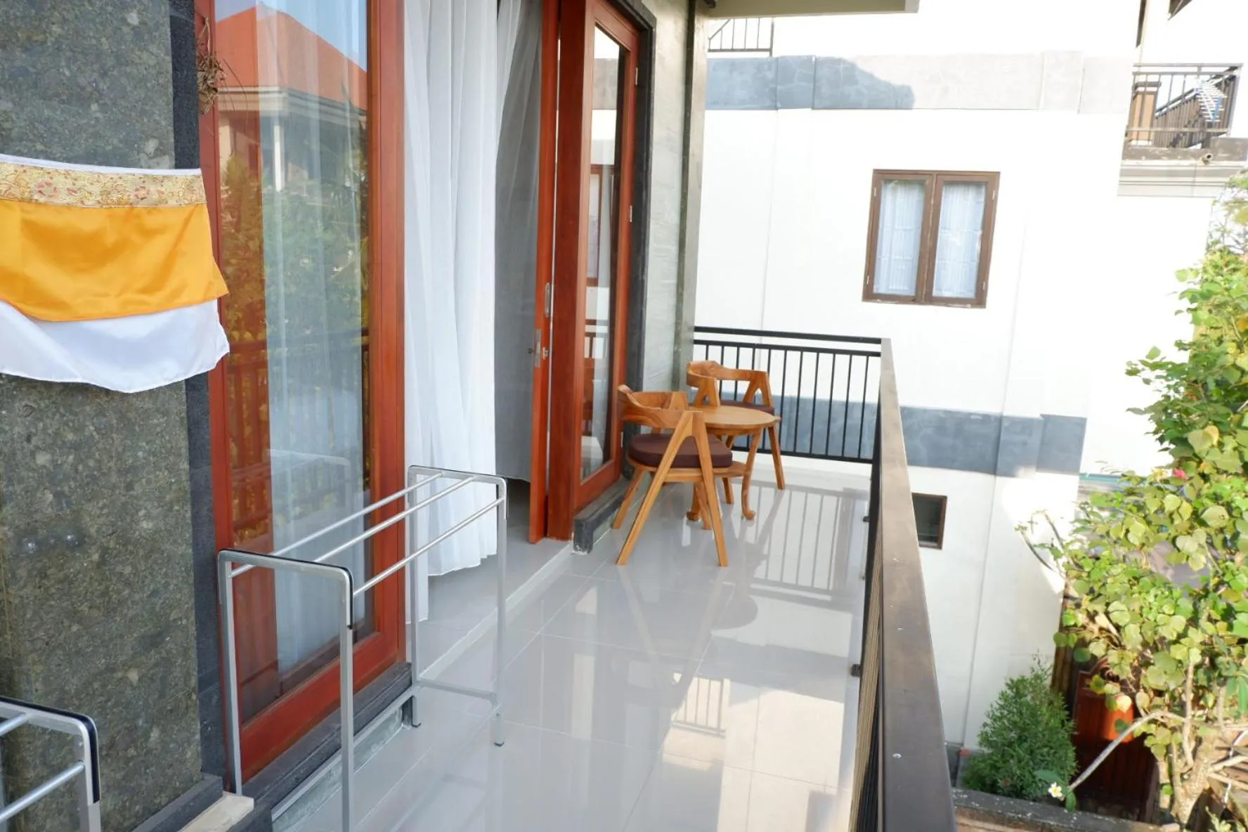 Balcony/Terrace in Three Dewi's Guest House