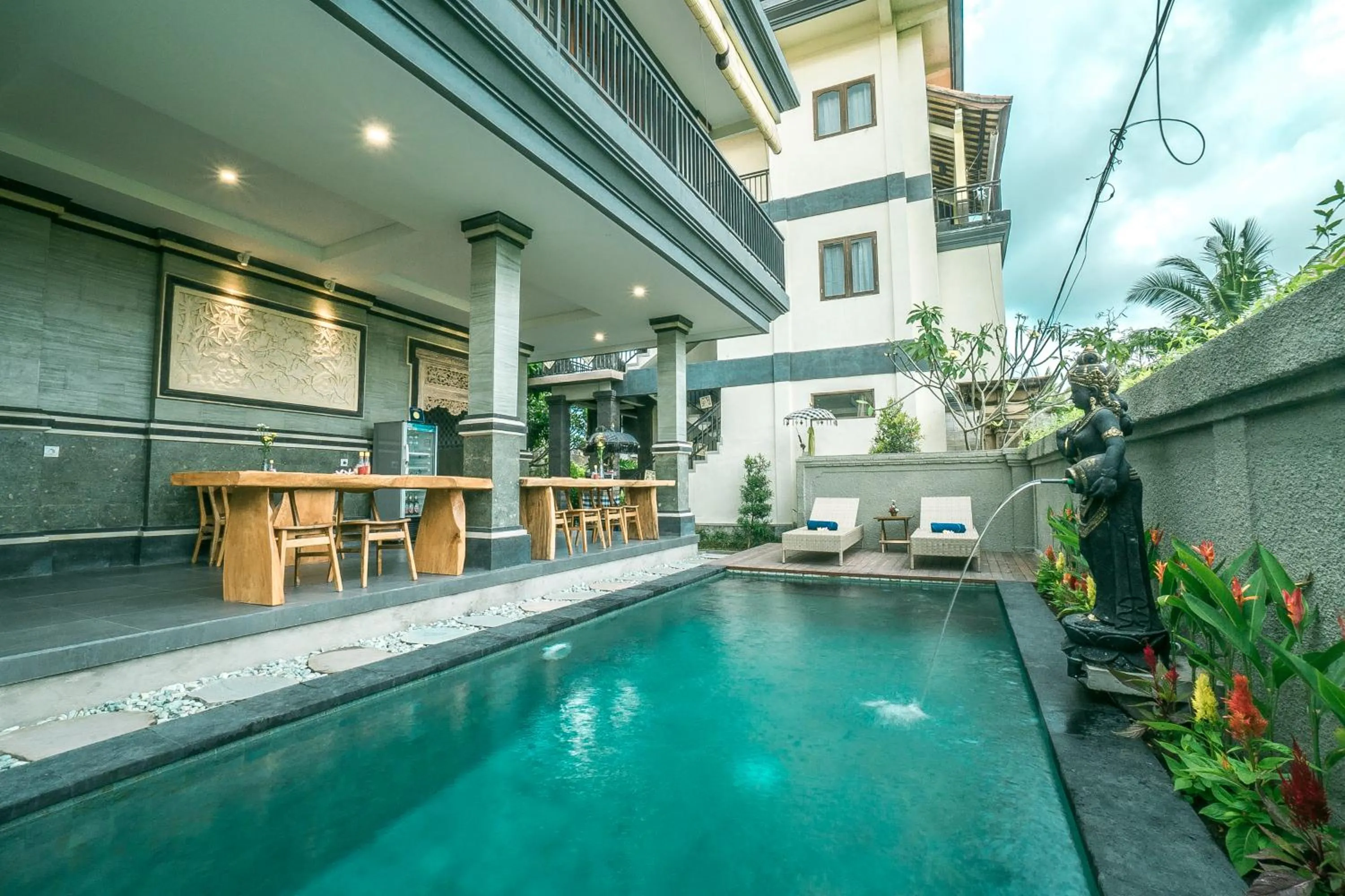 Swimming pool in Three Dewi's Guest House