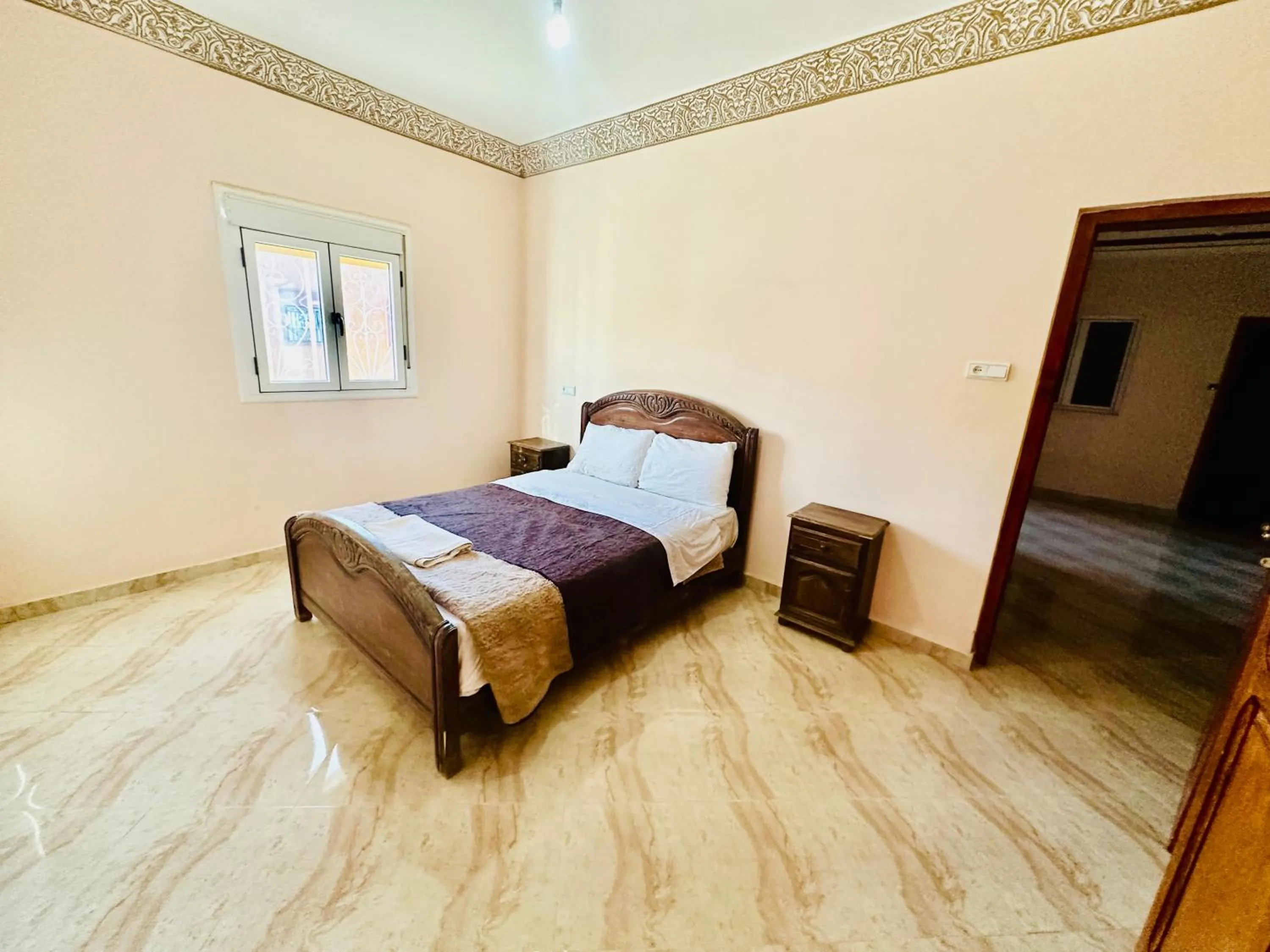 Bed in Merzouga desert apartment