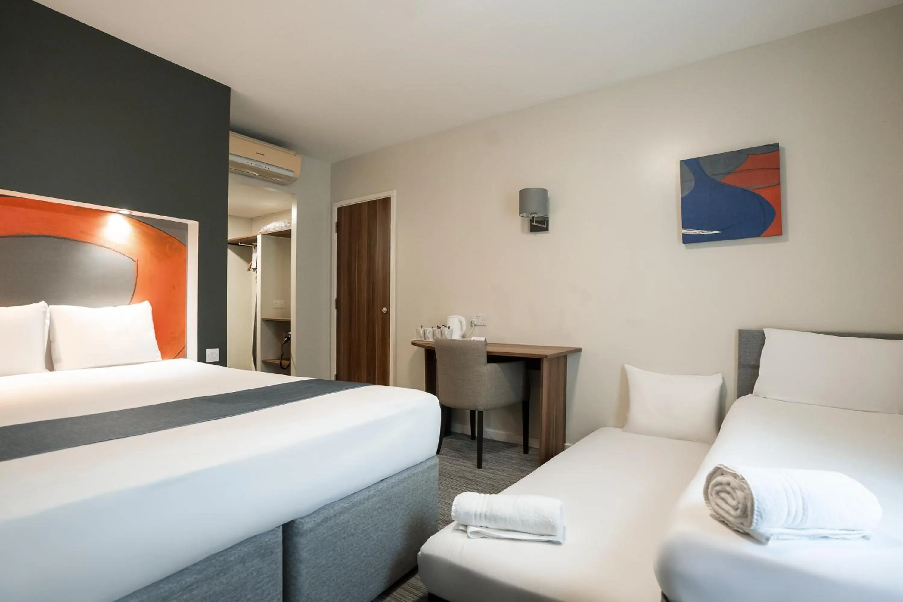 Bed in Ramada London Stansted Airport