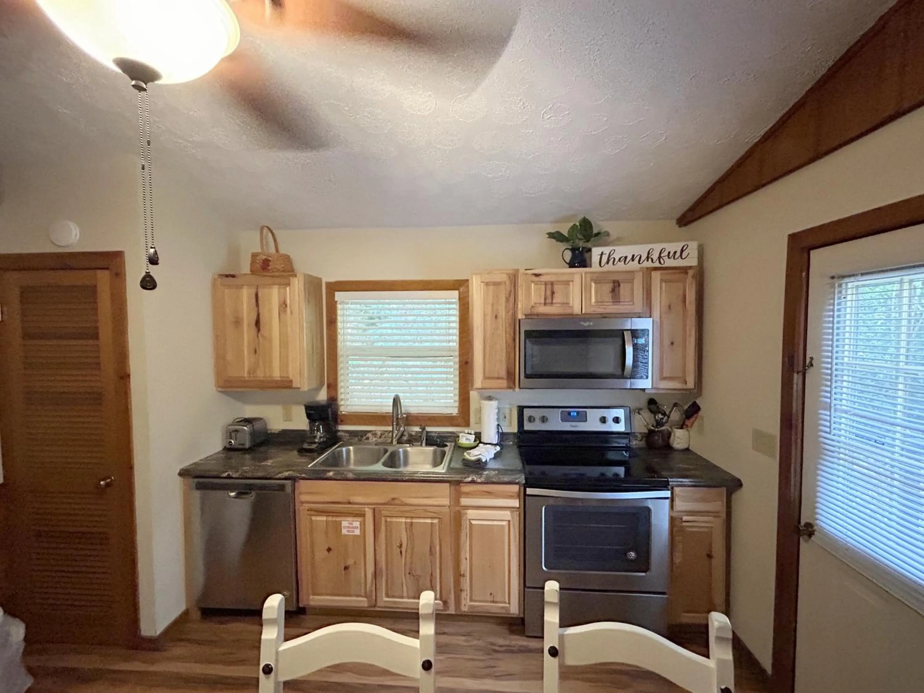 Kitchen or kitchenette in Tucked Away Cabin