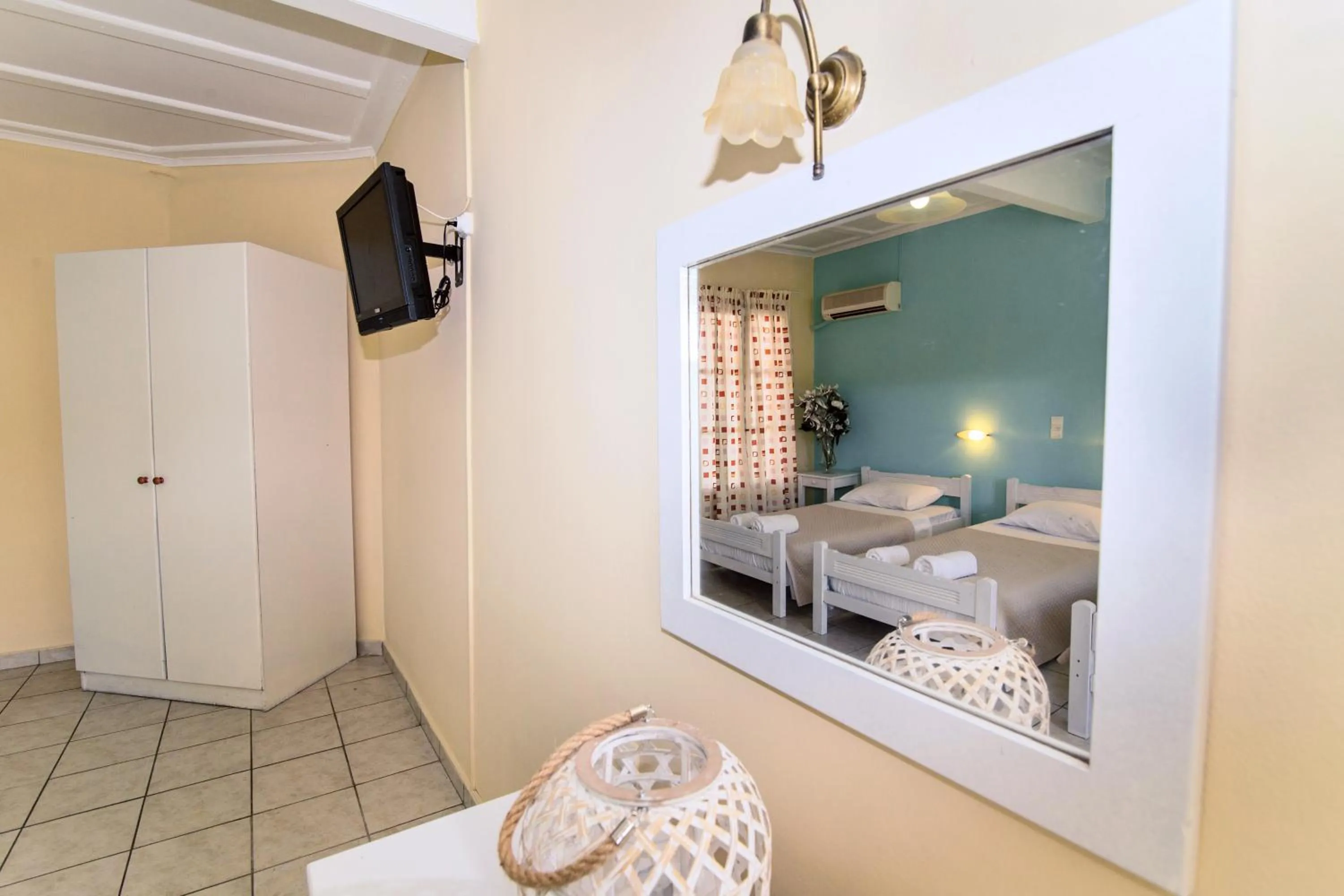 Bedroom in Blue Palm Hotel