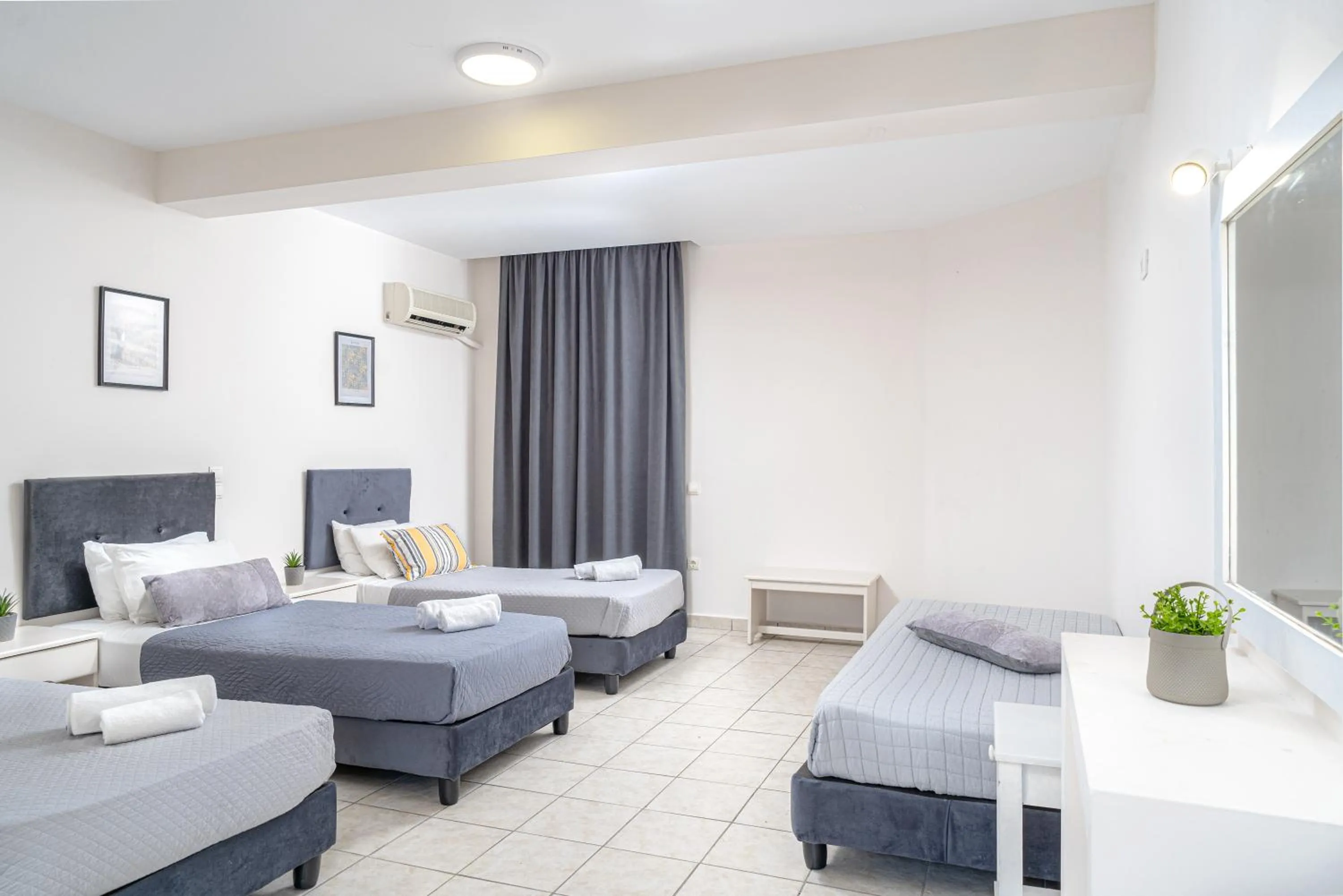 Bed in Blue Palm Hotel