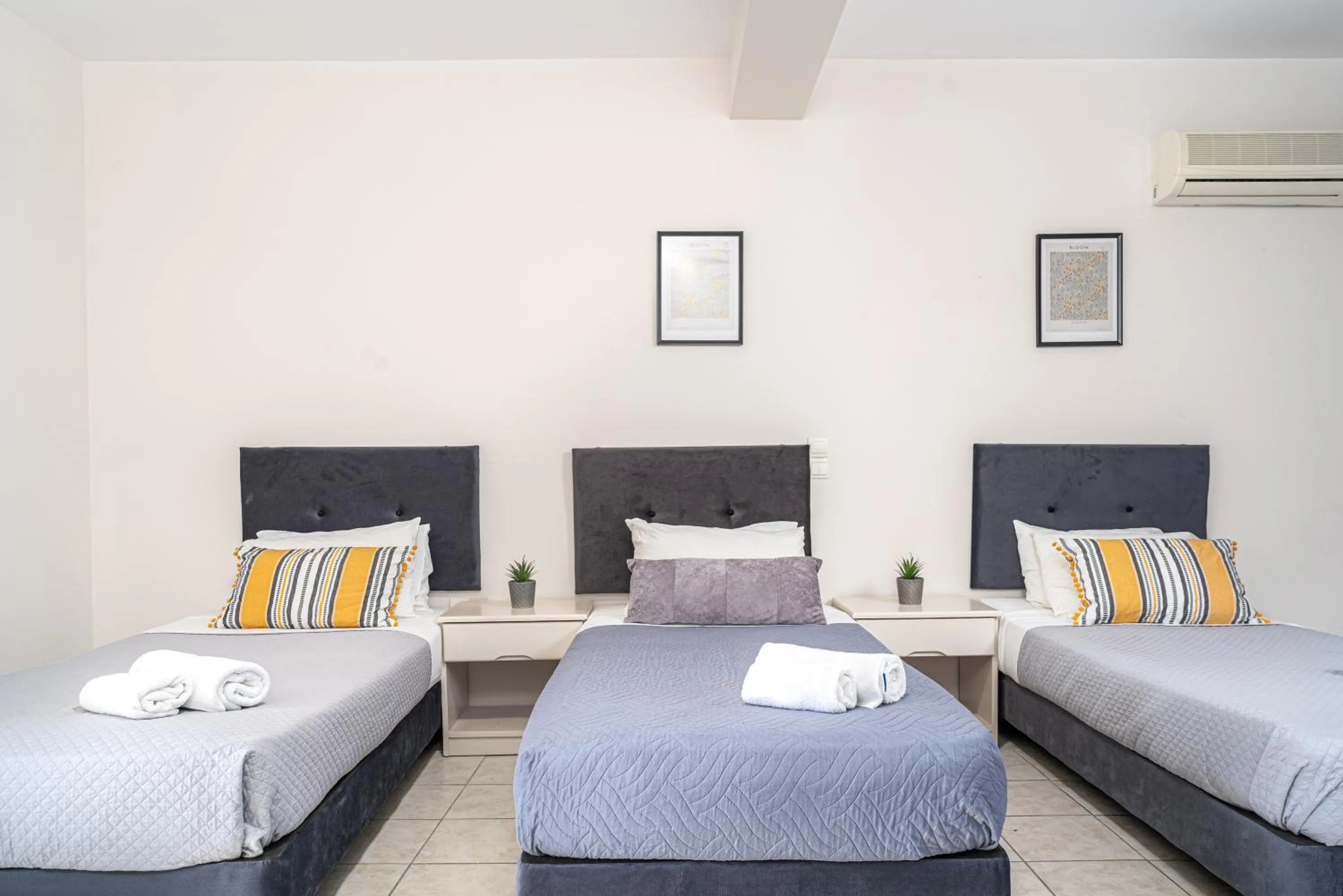 Bed in Blue Palm Hotel