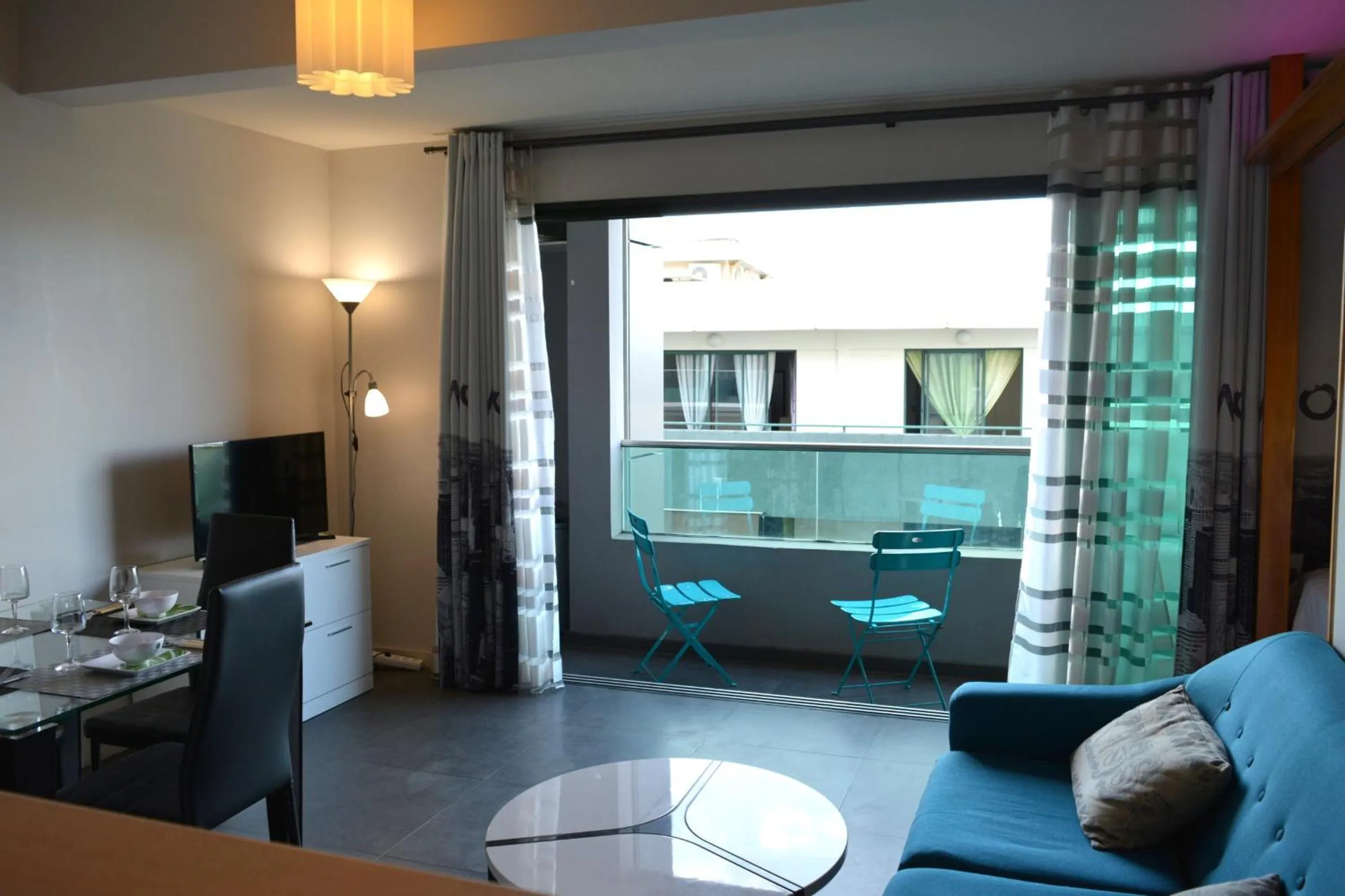 Living room in Moana Studio - downtown Papeete - WiFi AC Netflix parking - 3 people