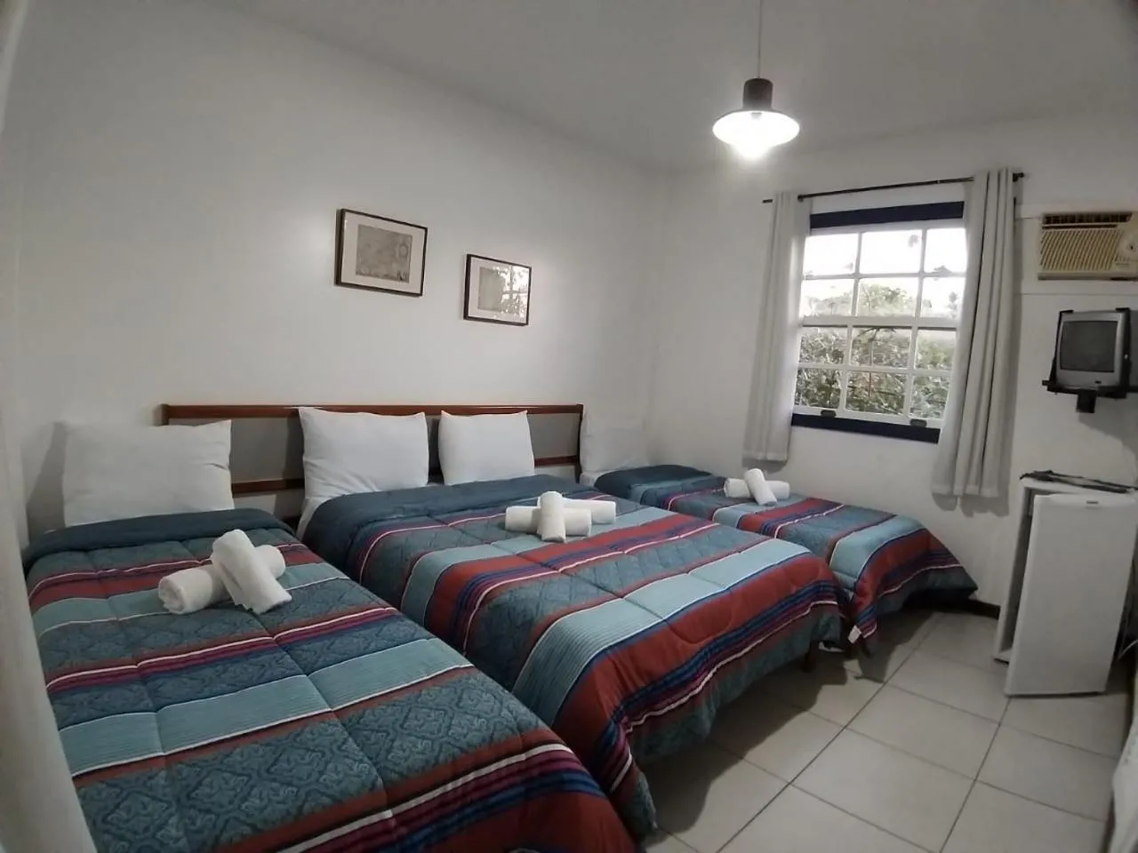 Bed in Pousada Maria Farinha