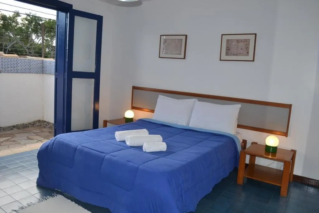 Bed in Pousada Maria Farinha