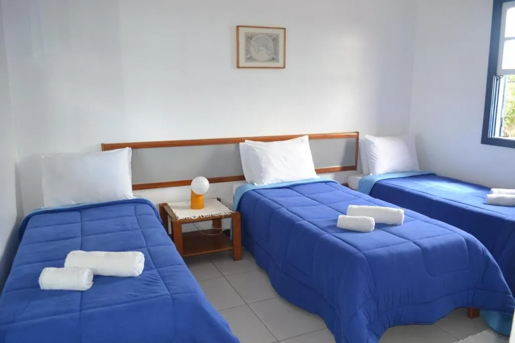 Bed in Pousada Maria Farinha