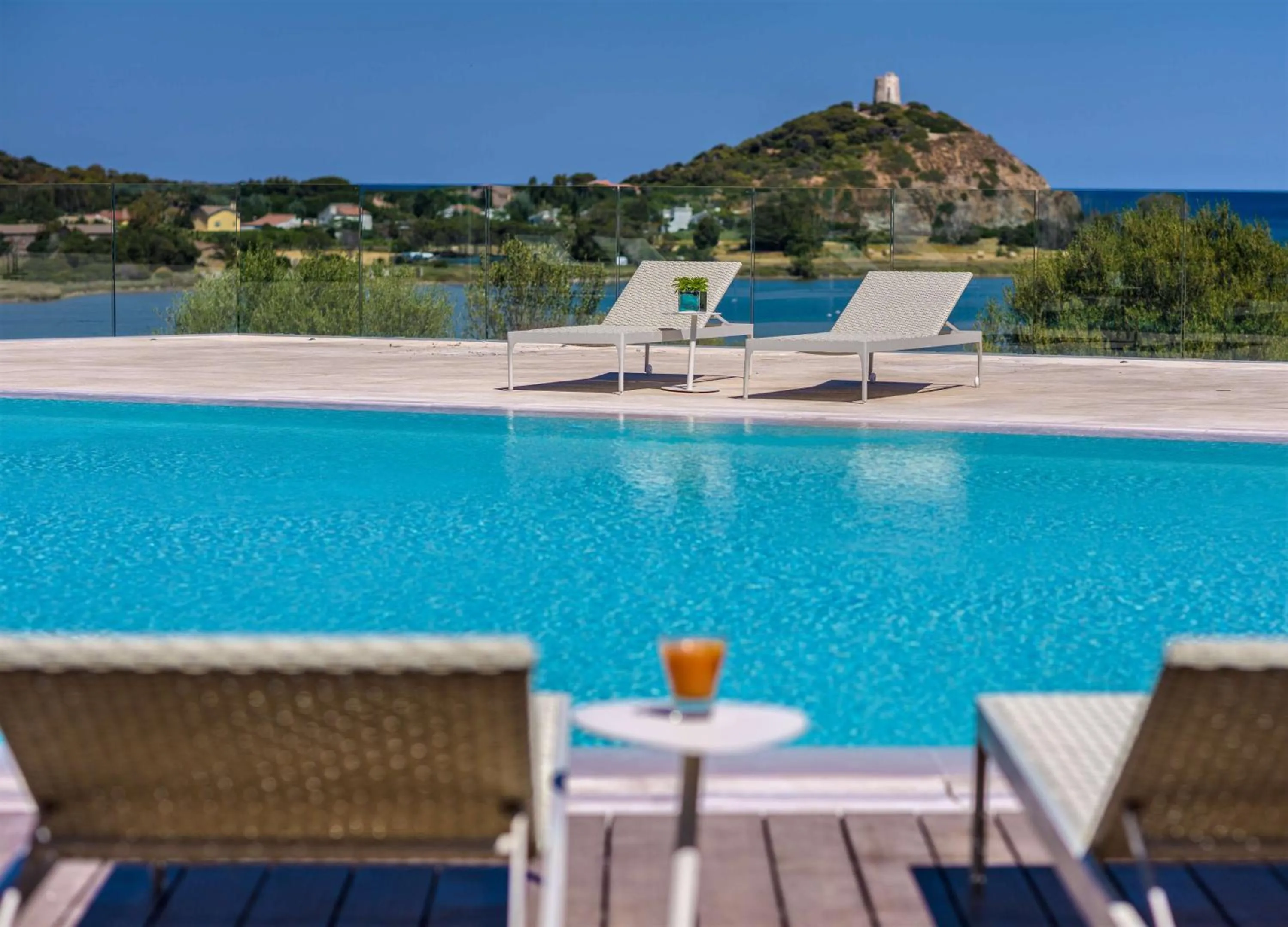 Pool view in Conrad Chia Laguna Sardinia