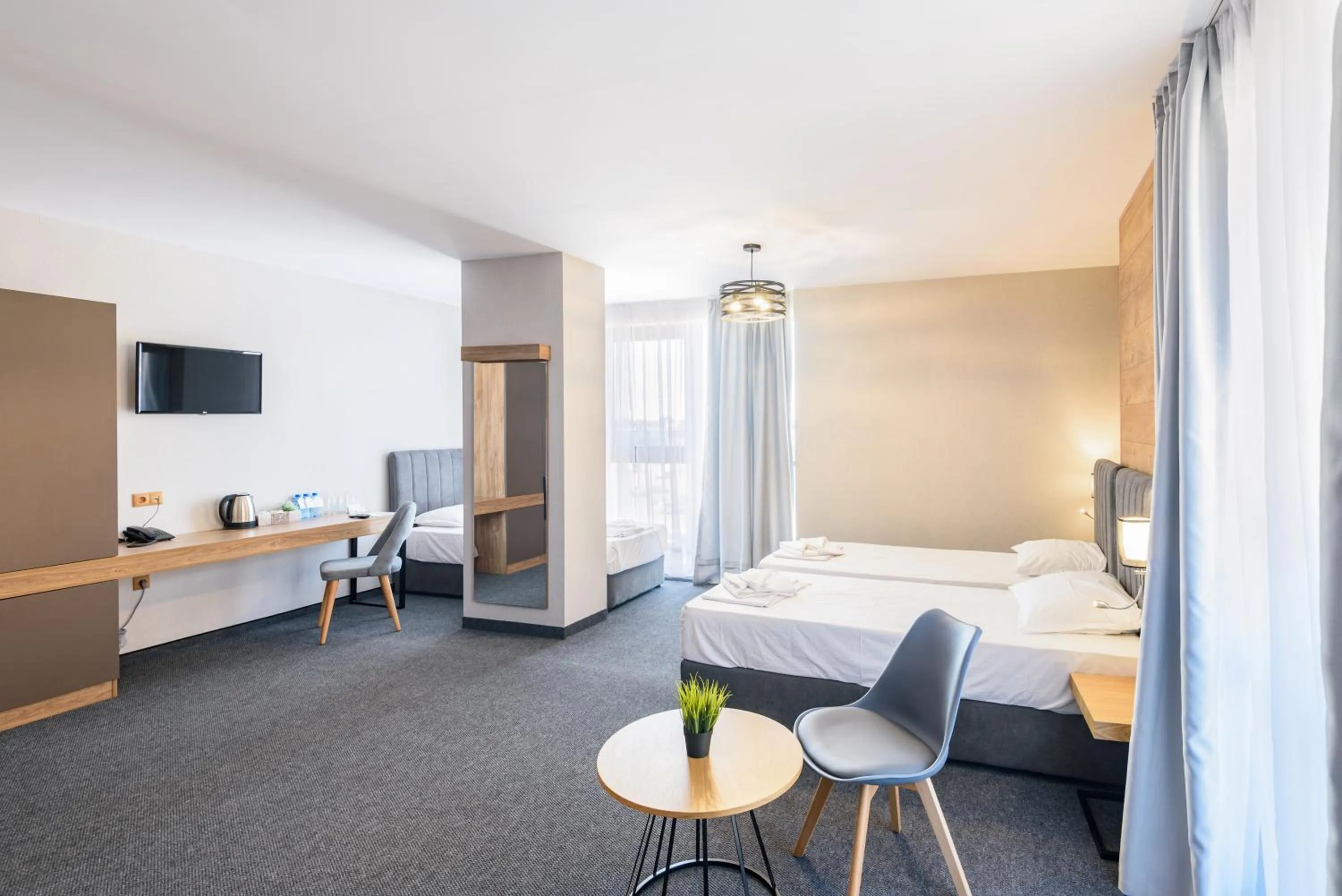 Bed in Avenue Hotel Deluxe