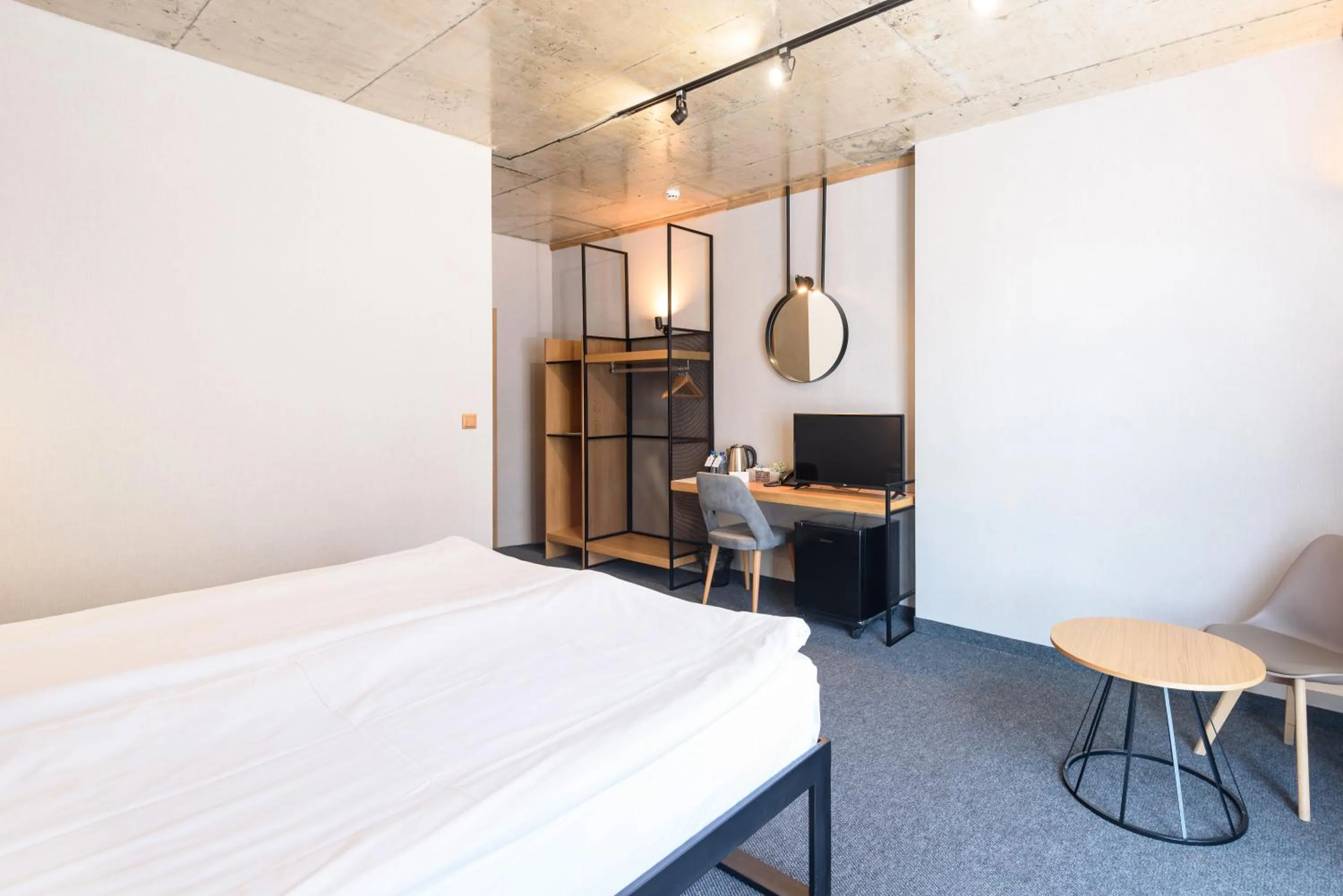 Bed in Avenue Hotel Deluxe