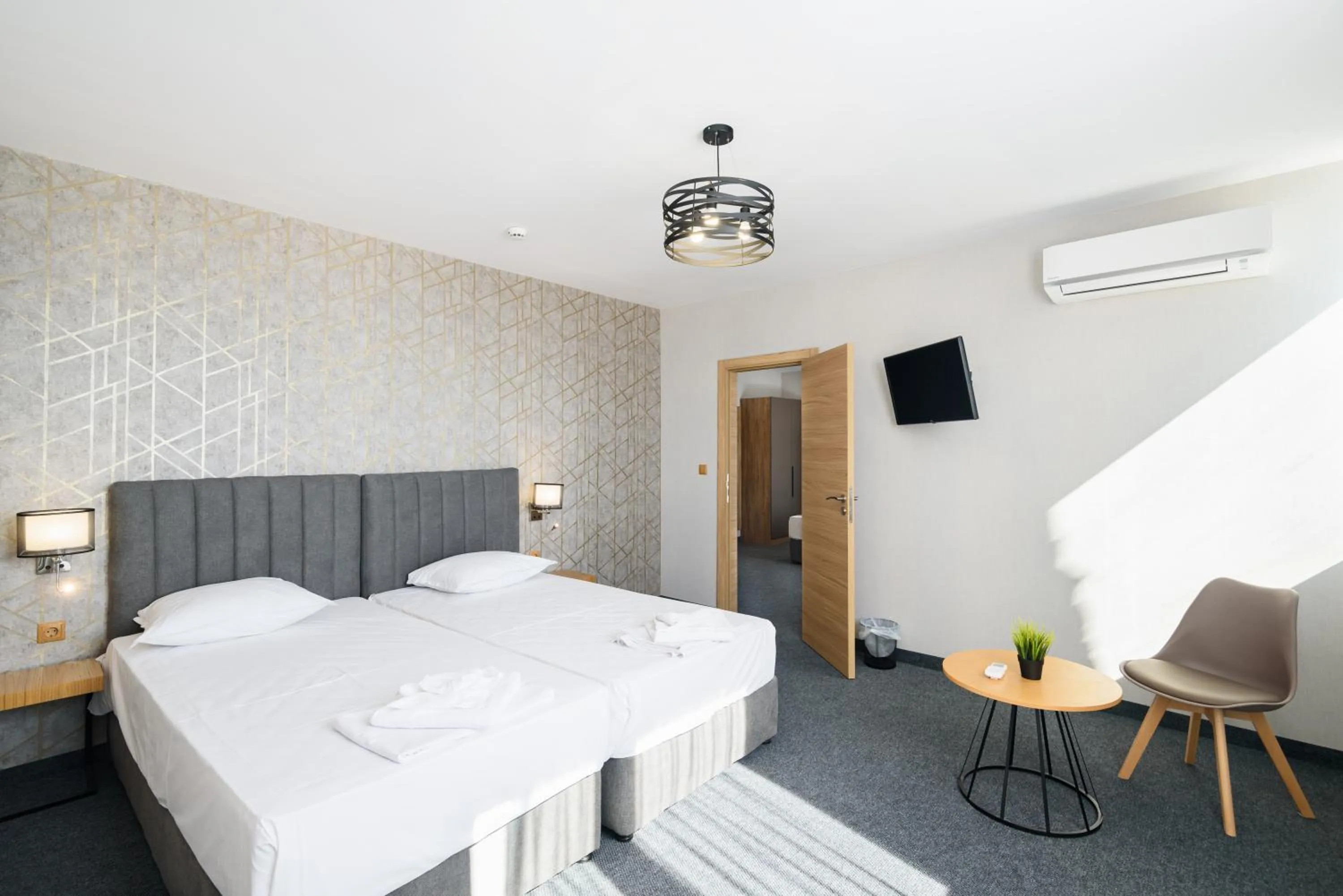 Bed in Avenue Hotel Deluxe