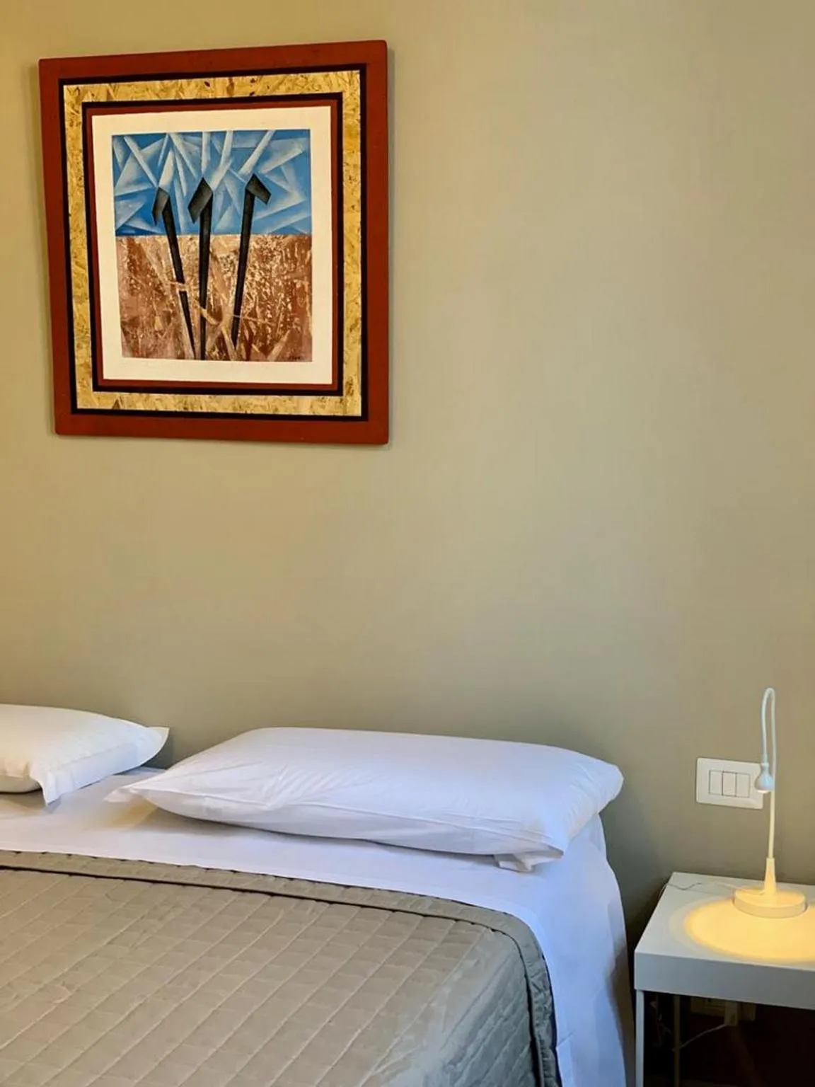 Photo of the whole room, Bed in Regis Condo