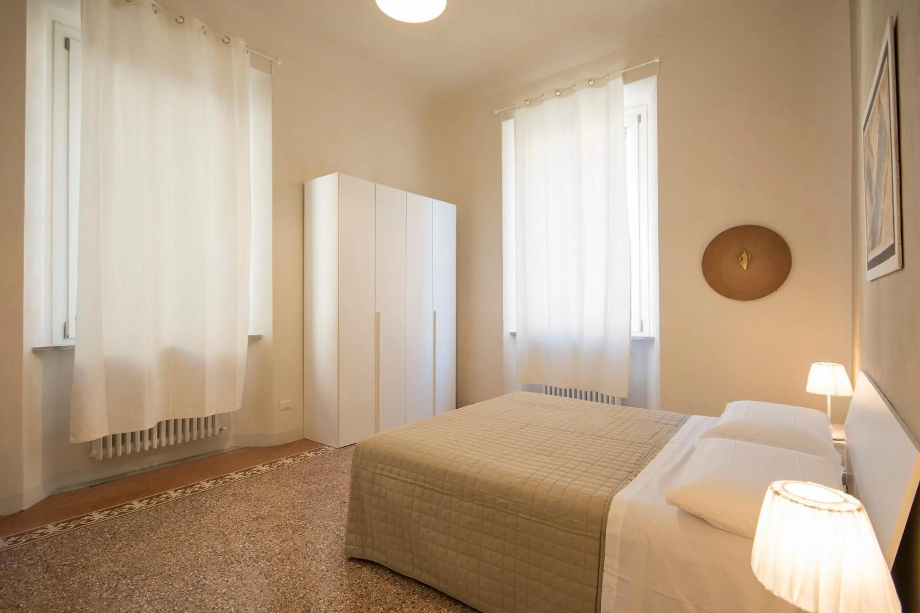 Photo of the whole room, Bed in Regis Condo